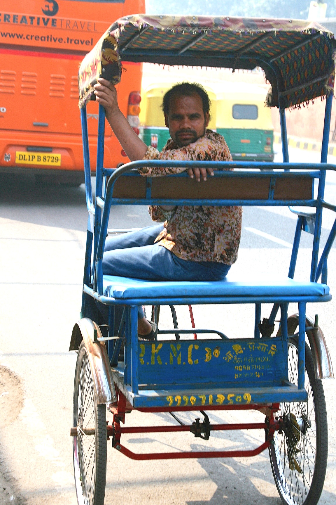 Rickshaw driver on break, Varanasi, India