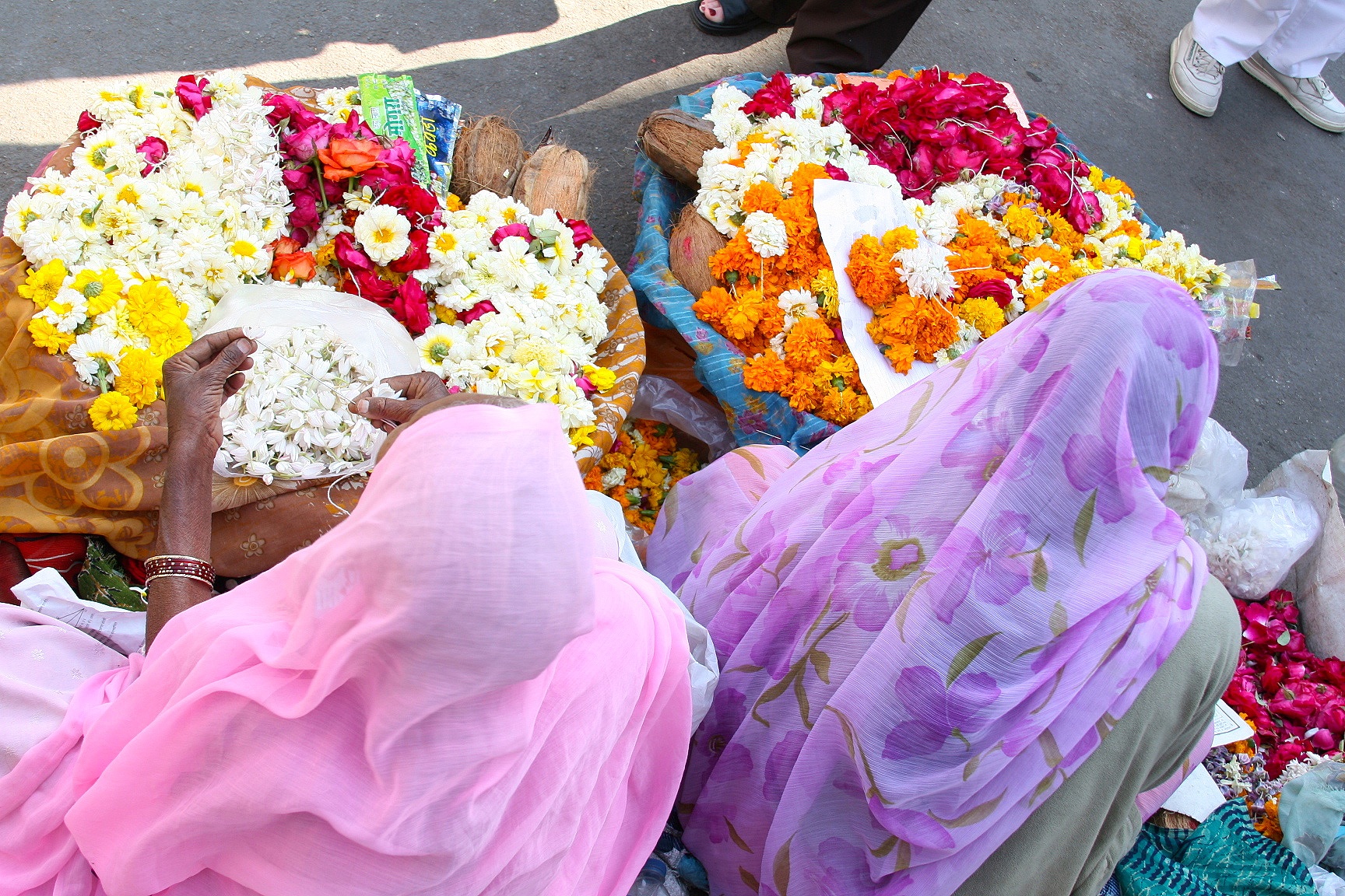 Woman making offerings, Udaipur, India