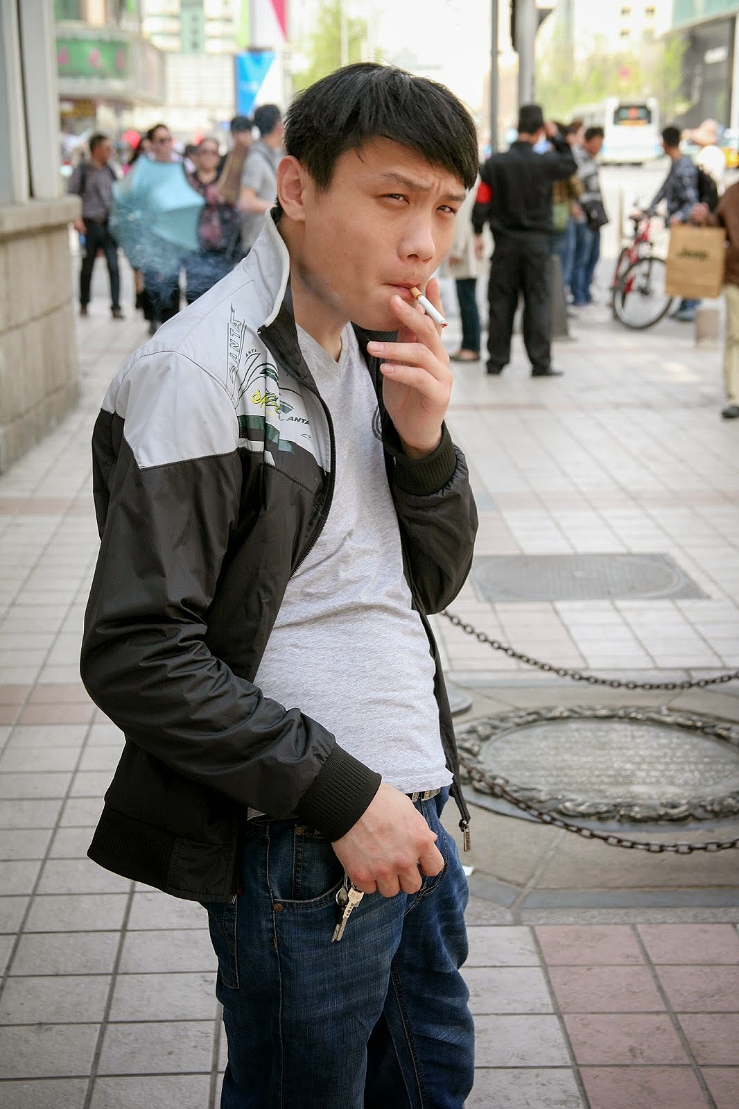 Man on street, Beijing, China