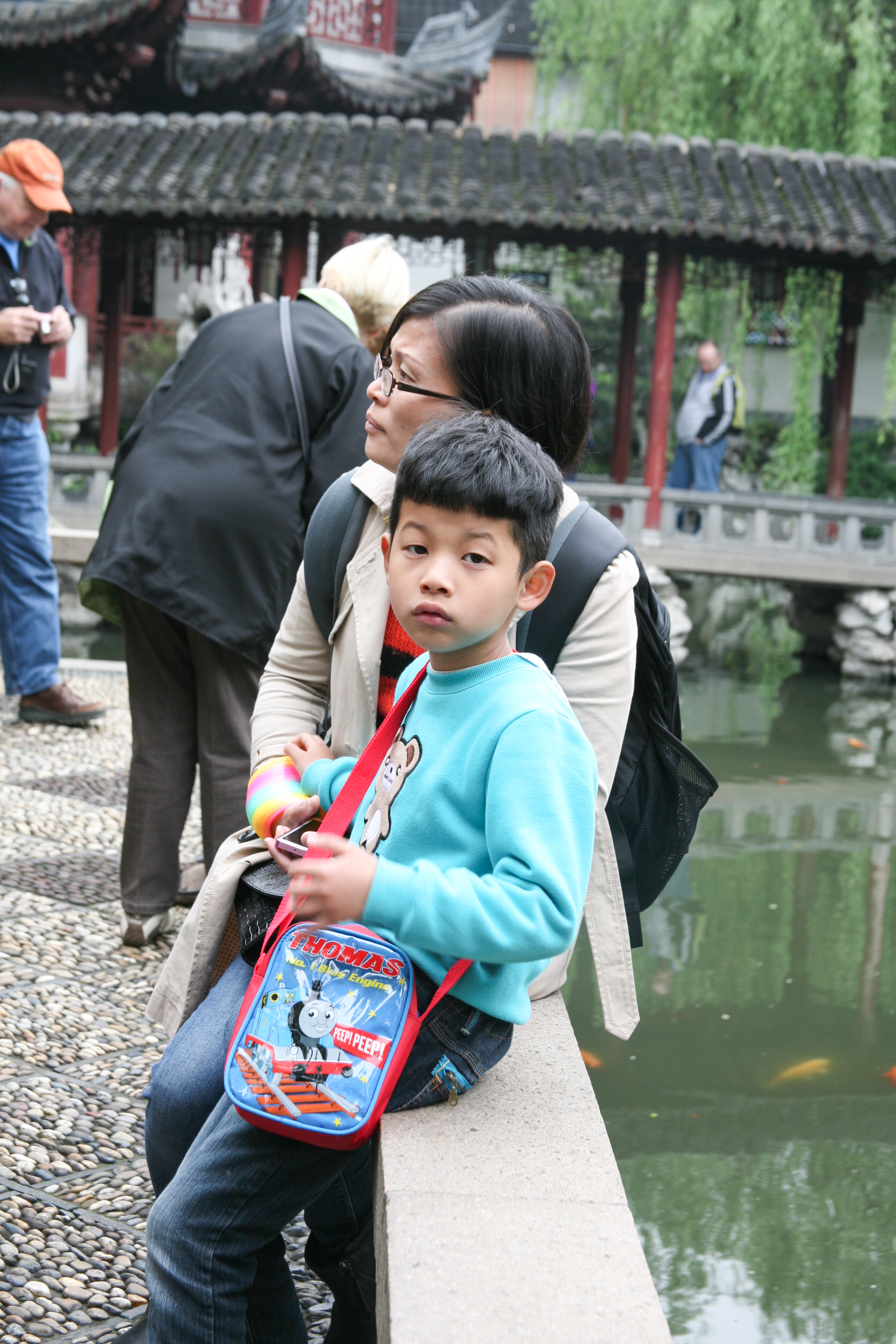 Boy with mother, Shanghai, China