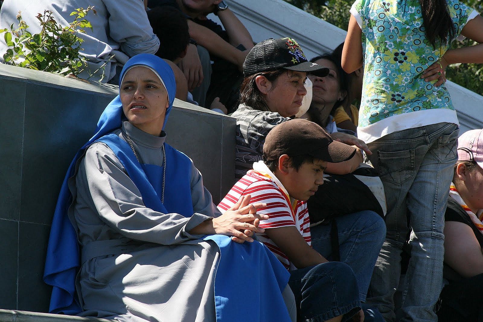 Young nun with children, Santiago, Chile