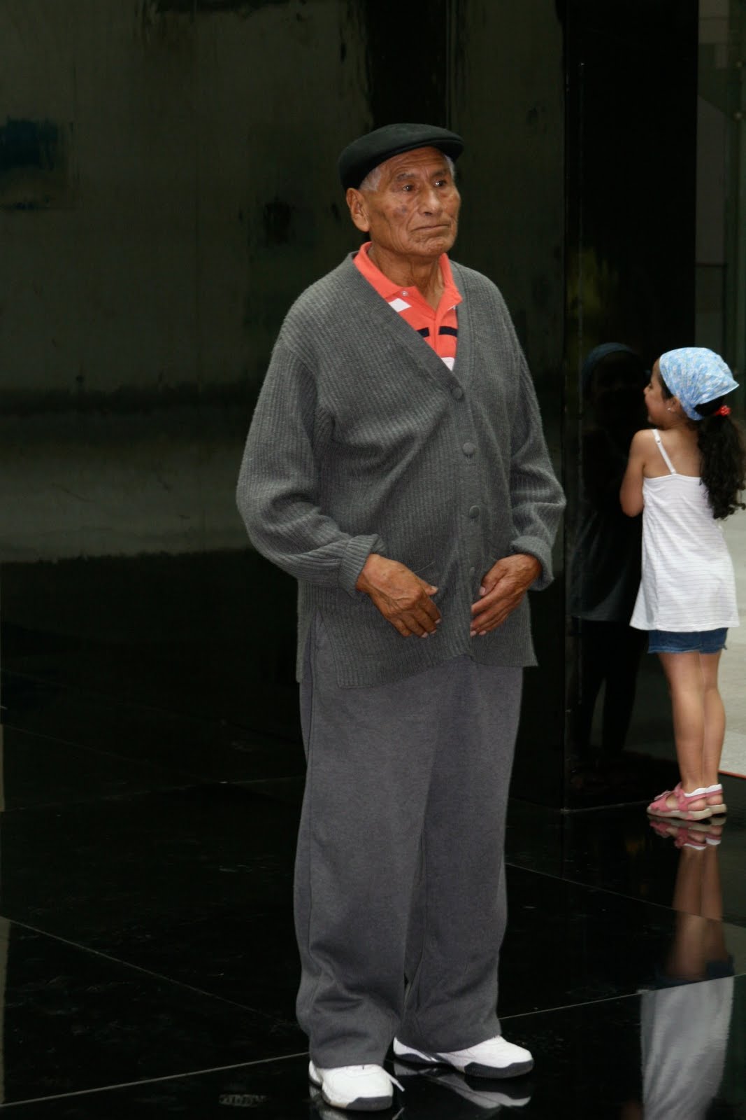 Grandfather with granddaughter, Plaza de Armas, Santiago, Chile