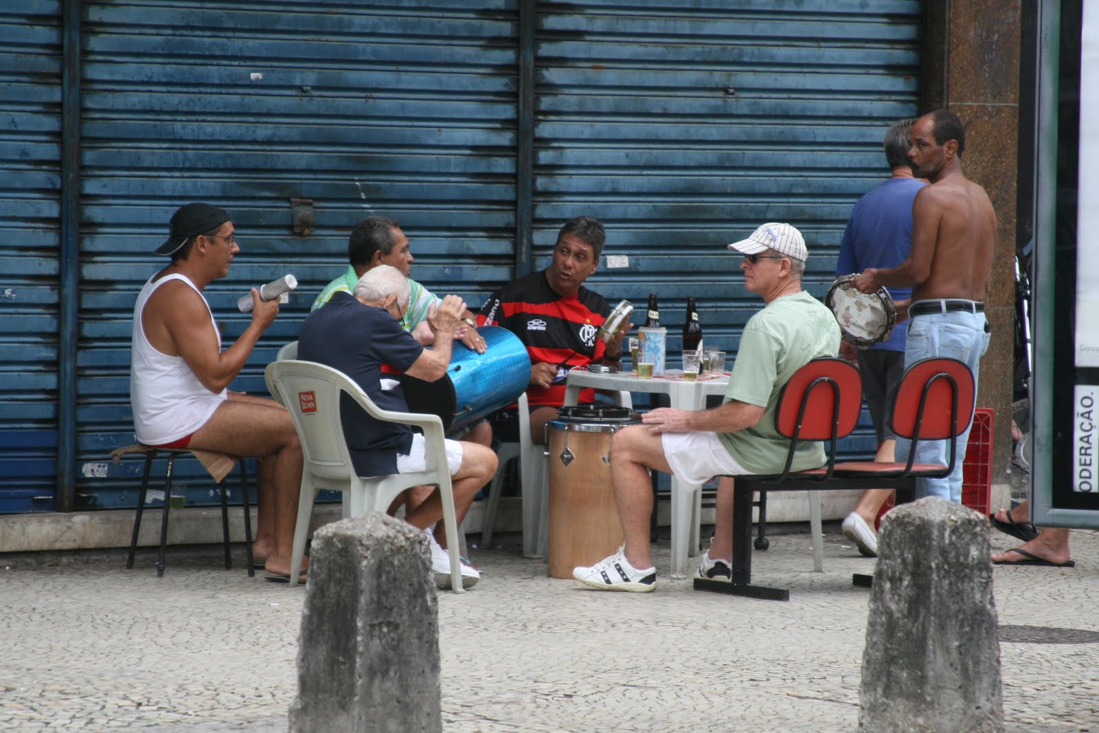 Locals chatting at Copacabana Beach, Rio de Janeiro, Brazil