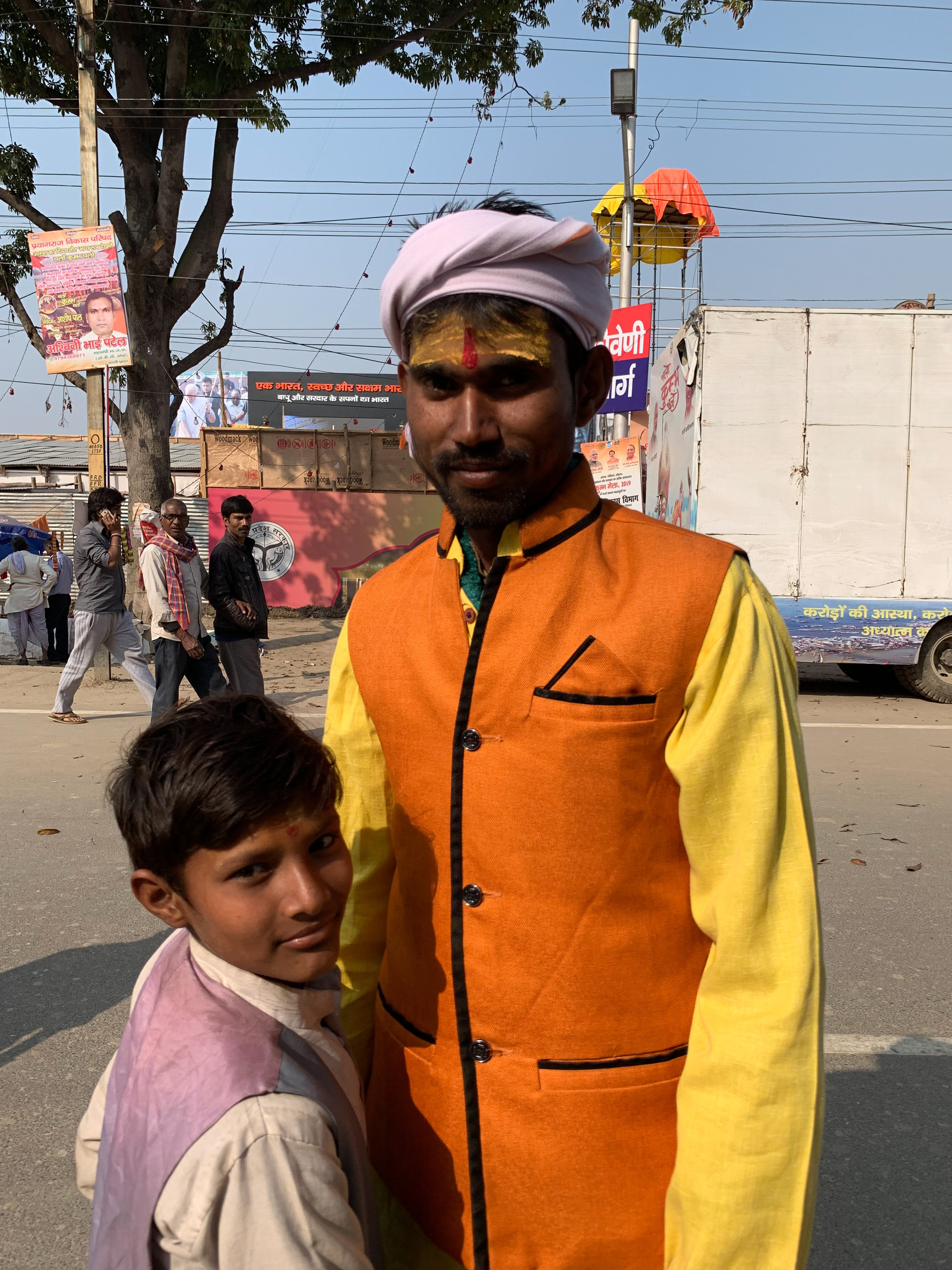 Father and son at Kumbh Mela, Prayagraj, India