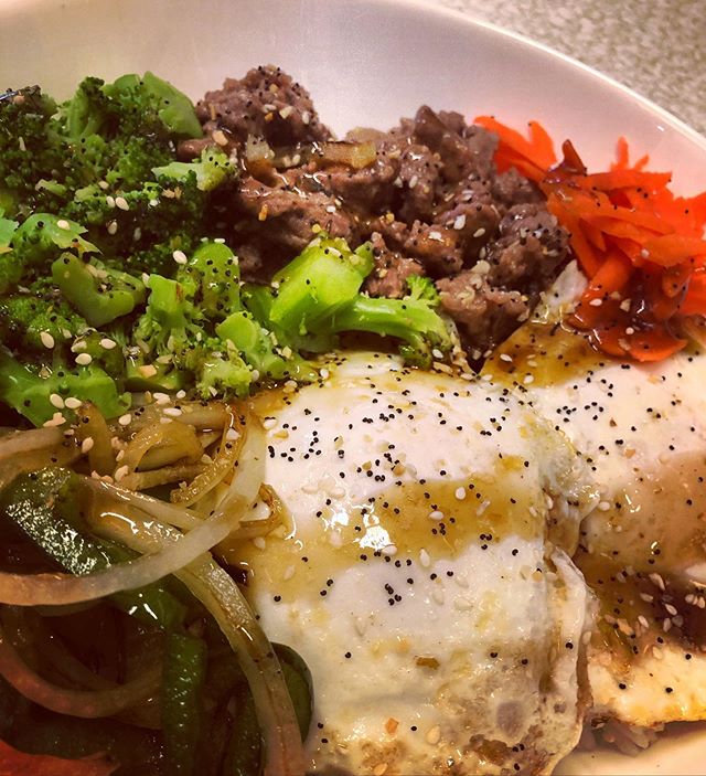 Korean Beef Bowl making an appearance first thing this morning on the brunch menu!  Steamed rice, bulgogi beef, broccoli, eggs, bell peppers and onions, shaved carrots and sesame sauce.