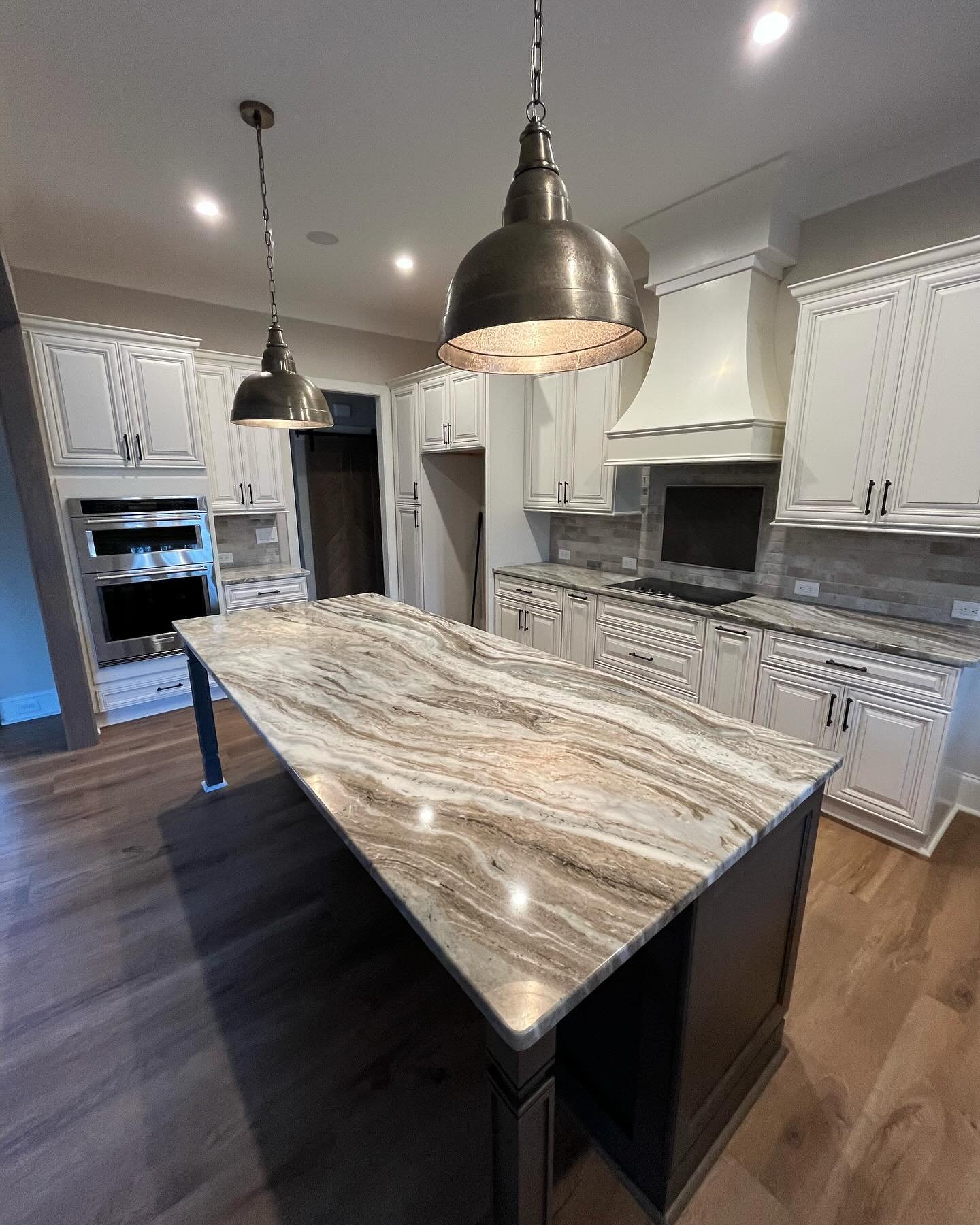 Fantasy Brown Marble, a material that looks amazing in your kitchen! As unique as a snowflake each slab has a unique design and color.  This hearty marble is actually very durable and a great choice for kitchens.  More and more people are choosing th