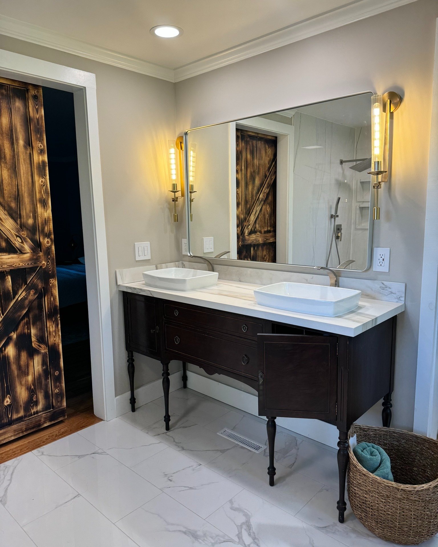 Putting the finishing touches on this #custommade #bathroom. Our artisans completed this bathroom's #Porcelain #Vanity top on a #vintage dresser and full wall Porcelain Shower Wall.
