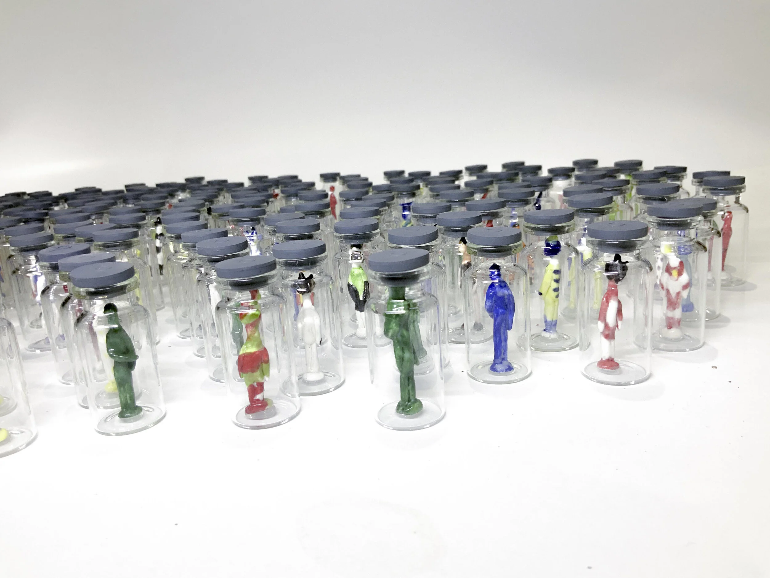 Argya Dhyaksa Mythical distancing 2020 ceramic in glass tube, 150 pieces, 10 cm x 3 cm diameter each