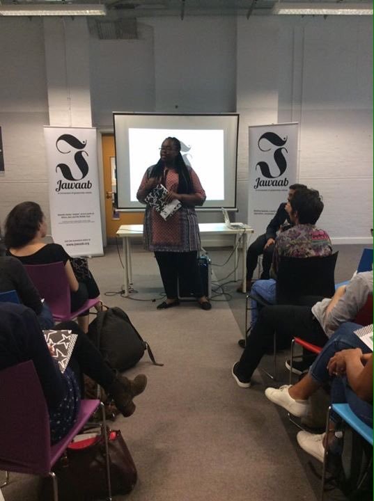 Khadija giving a talk about educational inequality at Jawaab in 2016. Image from Khadija Saye's personal Twitter account @Saye_Photo.