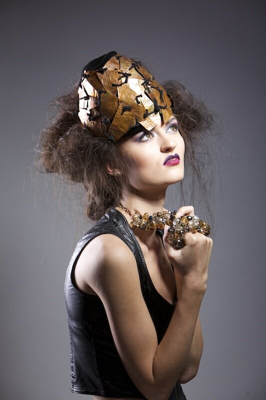 Avant garde velvet and copper head piece.