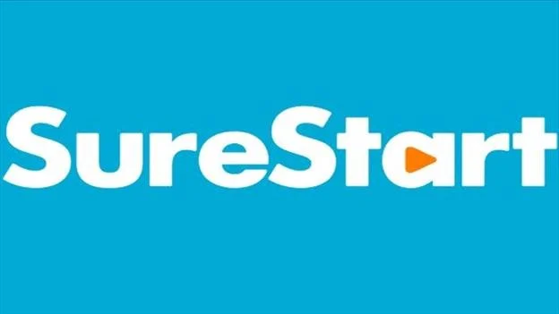 Logo with the words 'SureStart' in white with a small orange arrow inside the letter 'a', on a blue background.