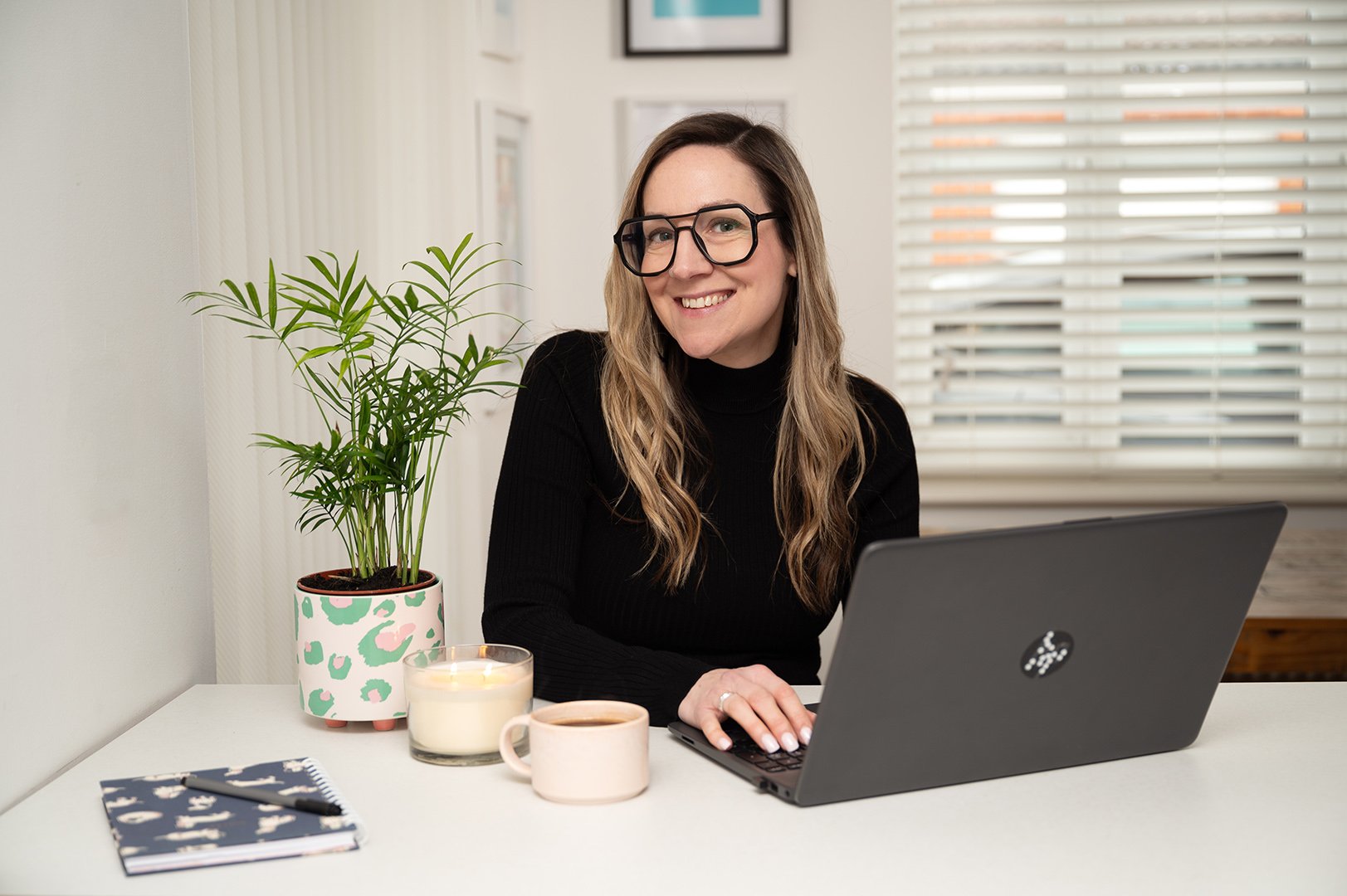 Branding Photography of virtual assistant on her laptop in Bristol.