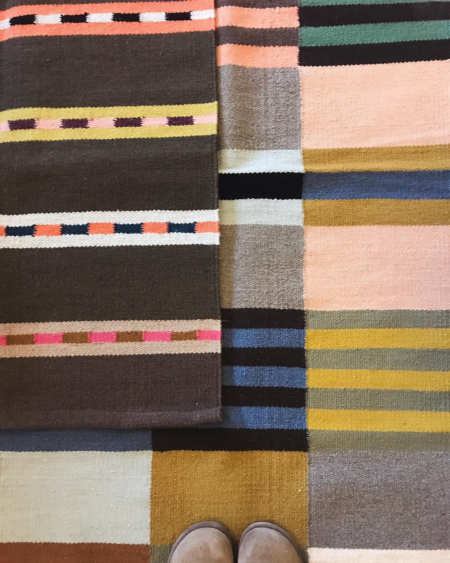 Woven striped wool rugs to cheer up a hallway. #scandinaviandesign