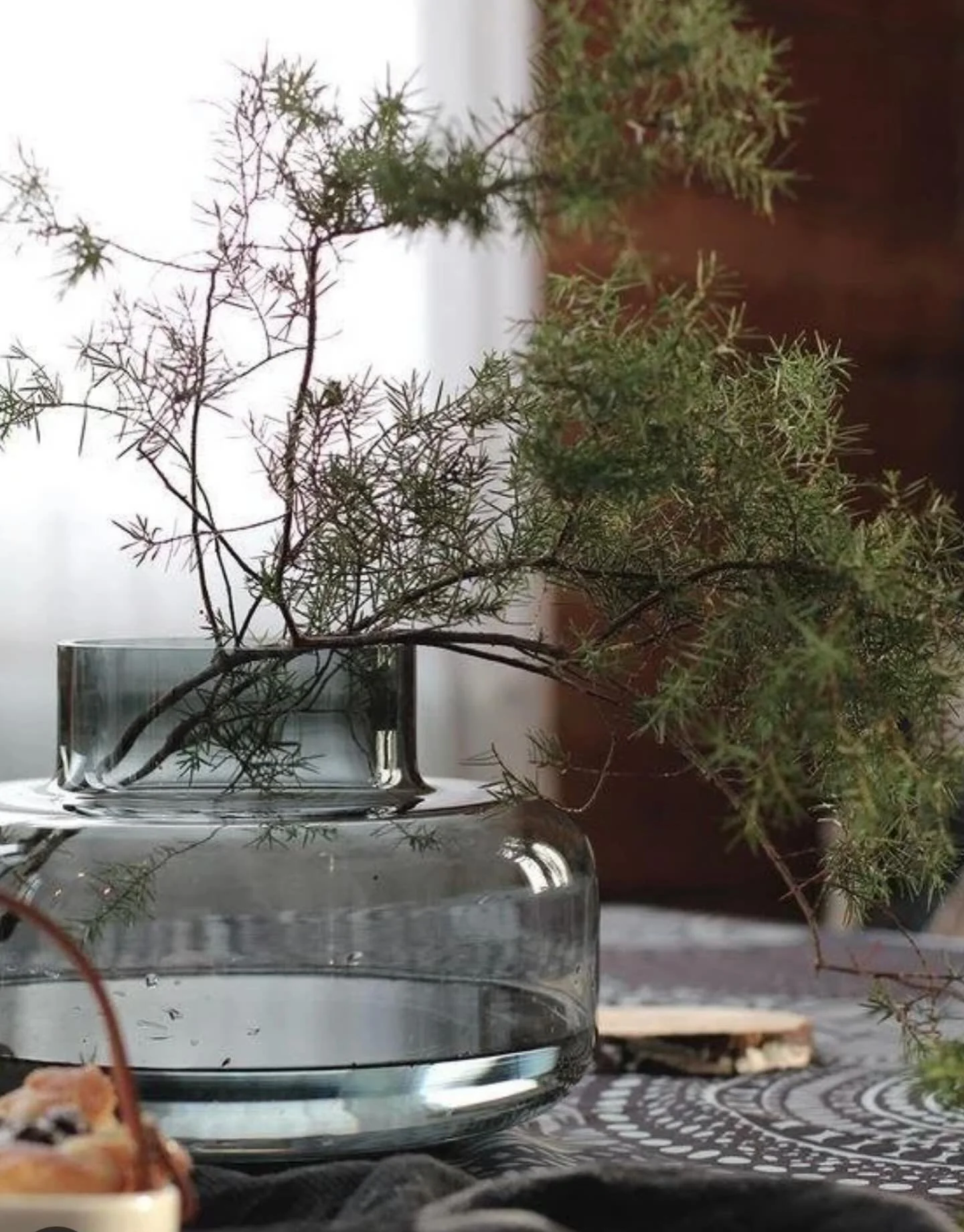 The large Urna vase is a perfect vessel for the seasonal greens.