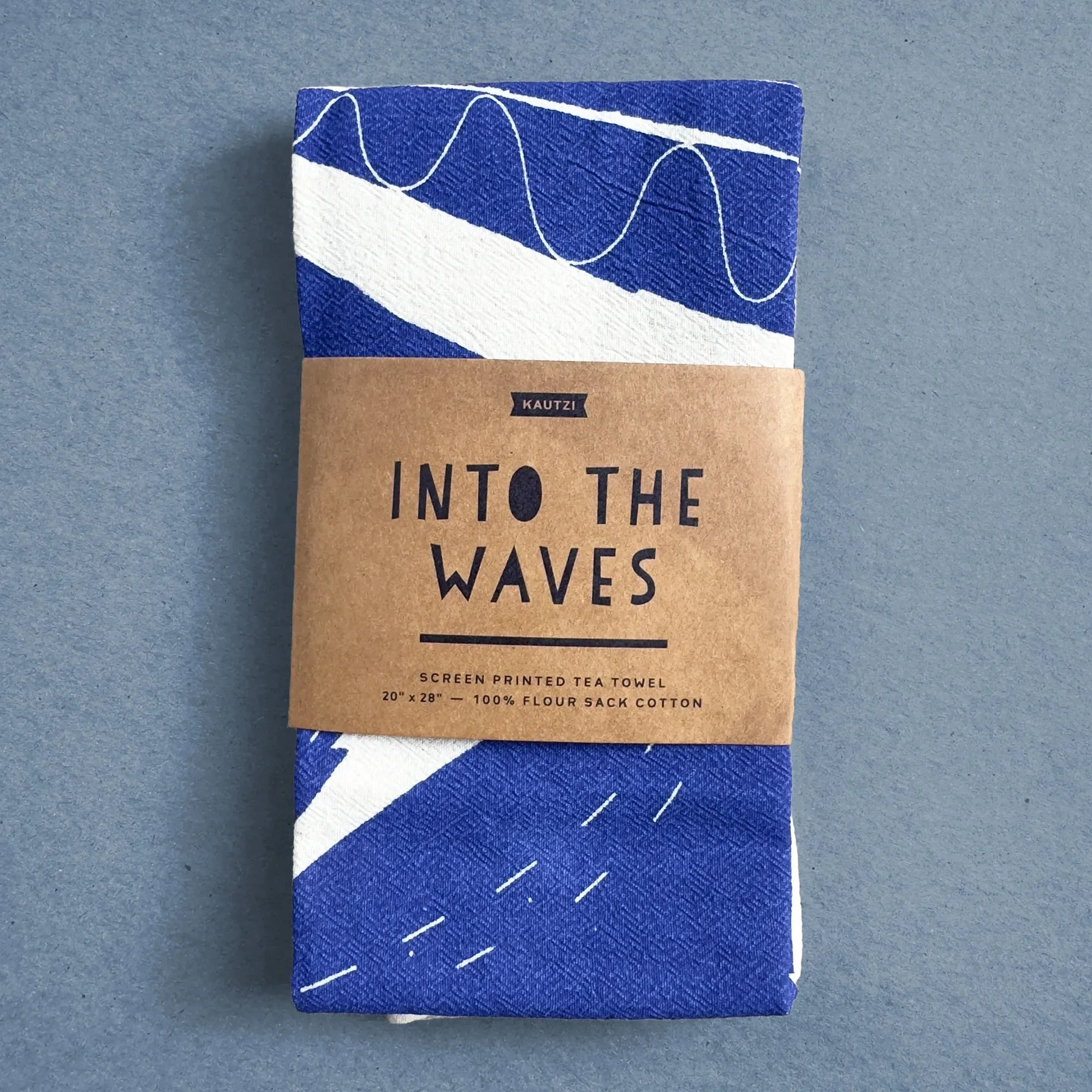 Kautzi_TeaTowel_IntoTheWaves_Wrapped.jpeg