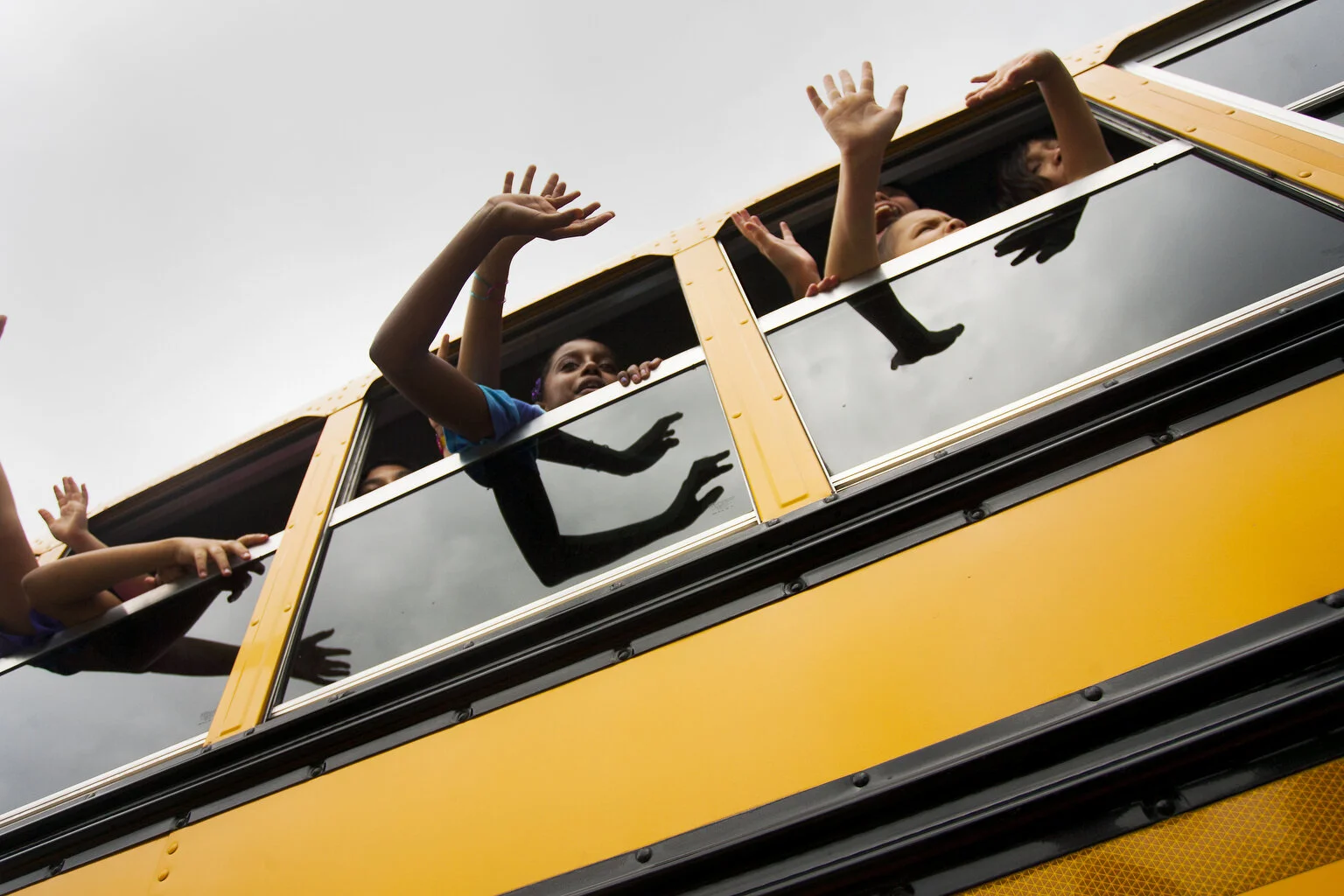  Moton Elementary school students wave their last goodbyes to teachers on the last day of school on Tuesday. Moton Elementary School in Brooksville celebrated their last day of school with the second annual "Clap Off" event for retiring teachers on T