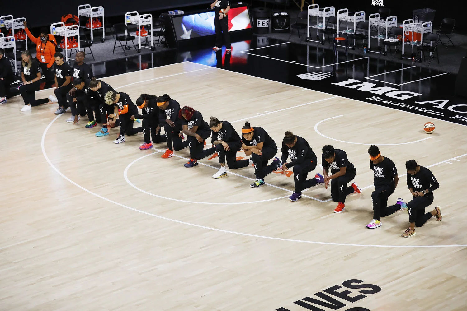  The Connecticut Sun take a knee during the playing of the National Anthem before the WNBA game against the Dallas Wings at Feld Entertainment in Palmetto, Florida, on Friday, August 6, 2020.  