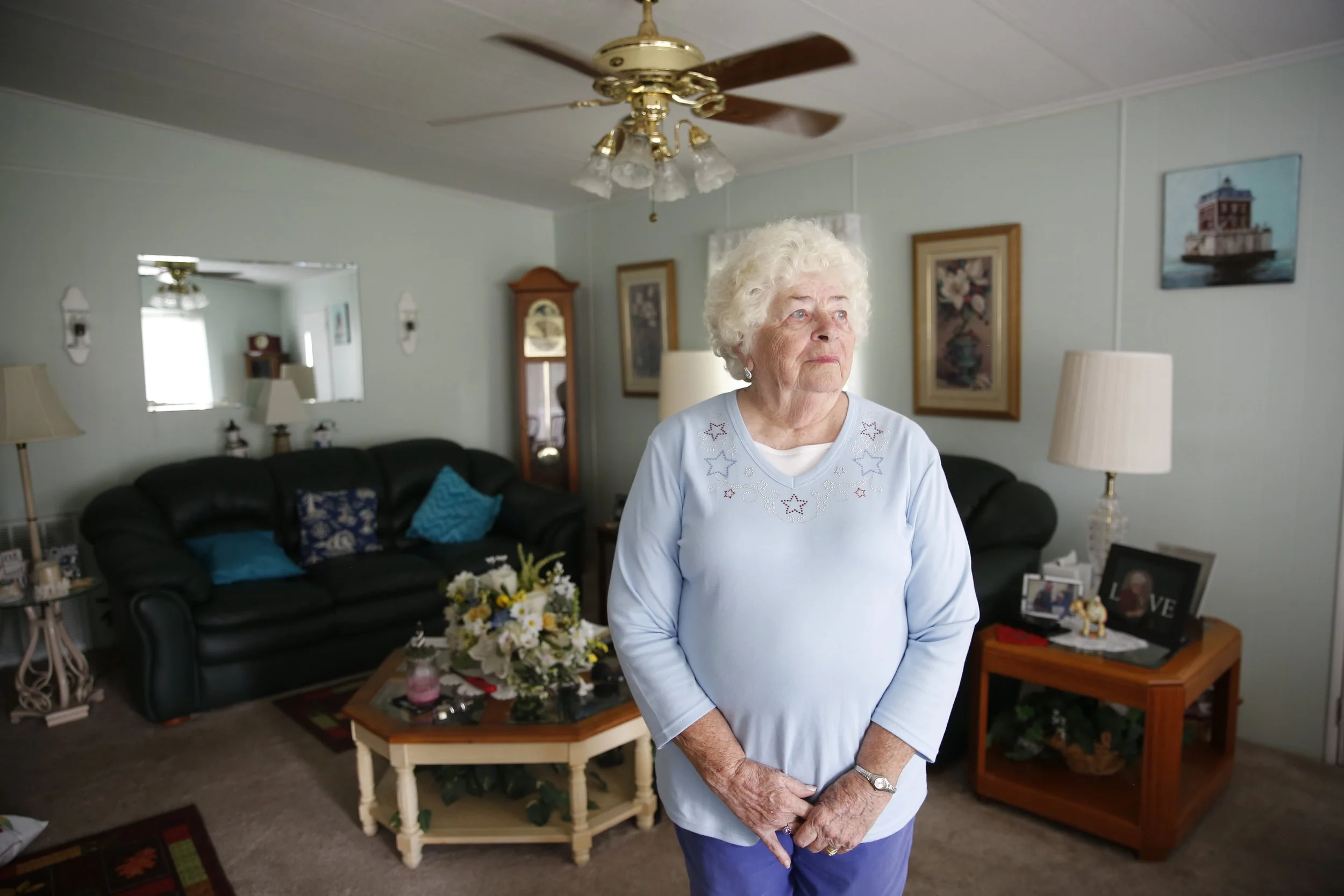 Judy Schofield, 86, a retiree who moved from Connecticut to the Royal Palm Village community in Haines City, Florida, took on a part-time job to help keep up with her bills due to rising lot rent. Octavio Jones/WUSF.