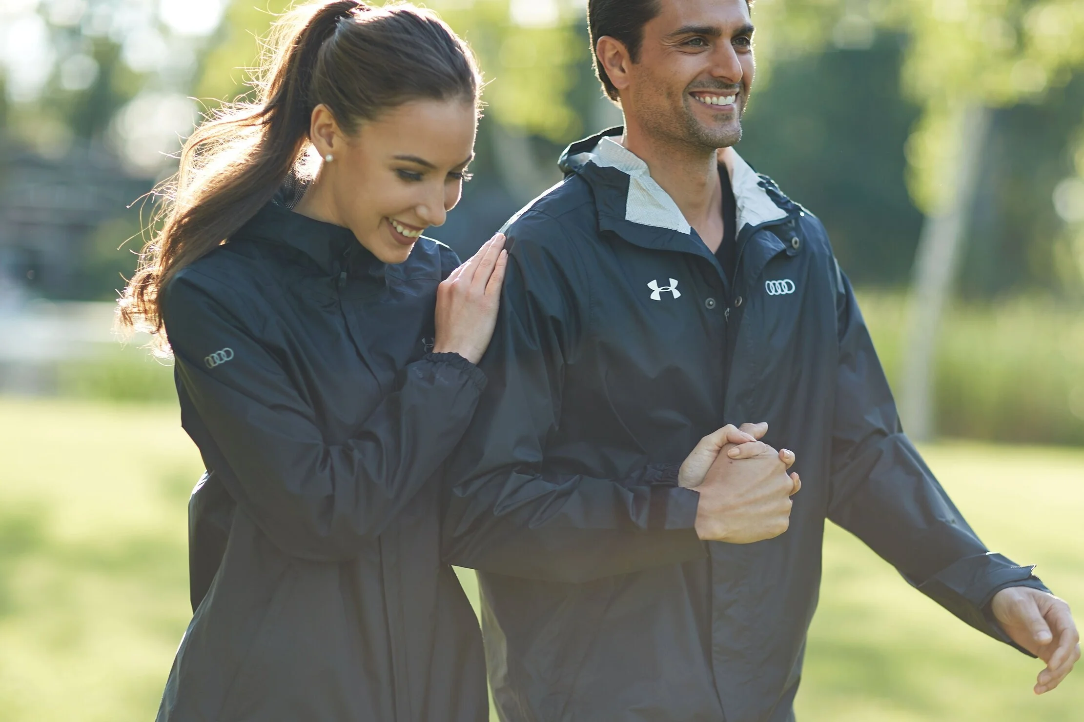9784818_AUDI_CoupleWearingRainJacketHoldingHands_mj.jpg