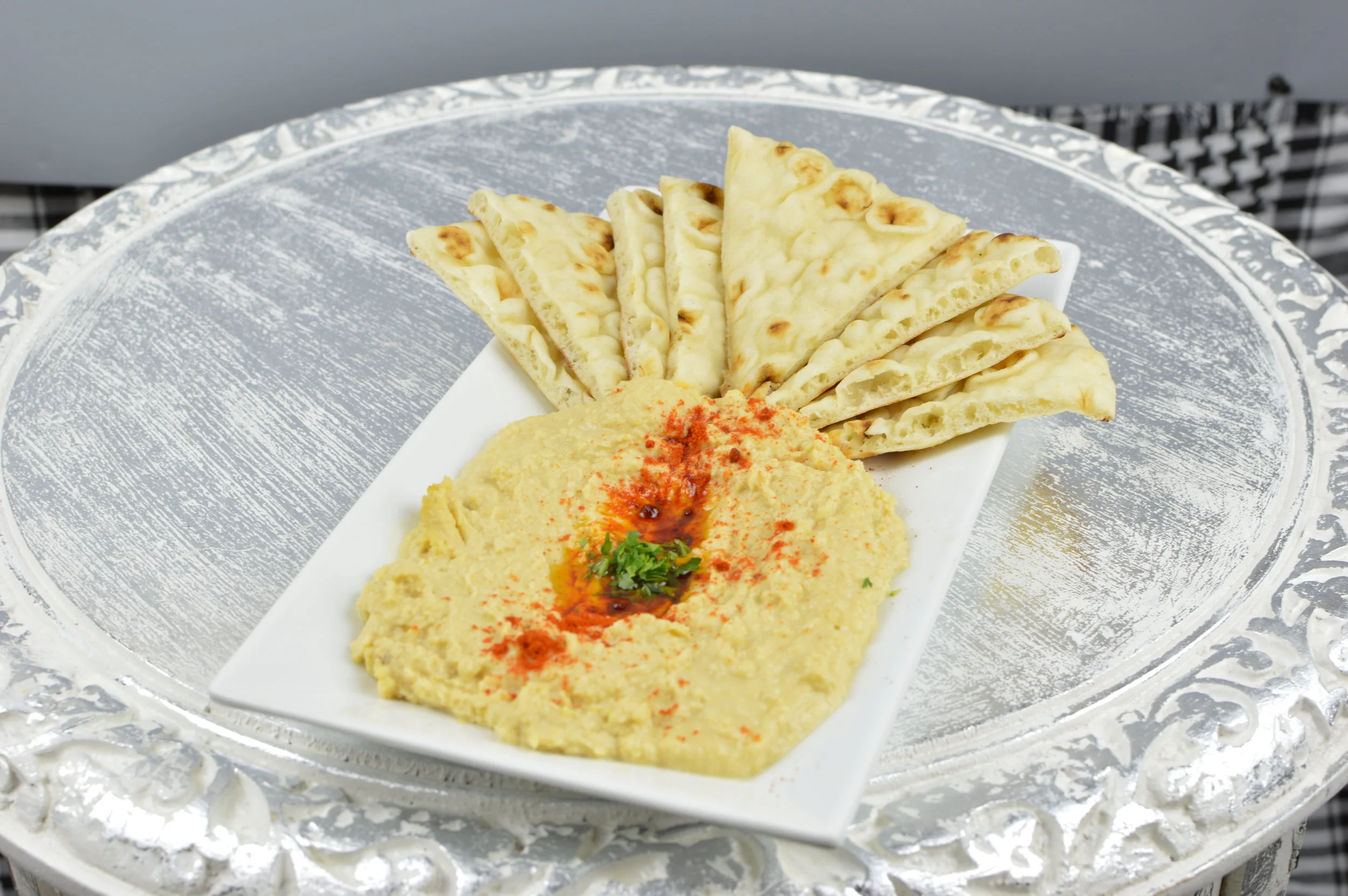 Hummus - Chickpeas puree mixed with fresh garlic, olive oil, fresh lemon juice, salt, and white pepper. $5.95