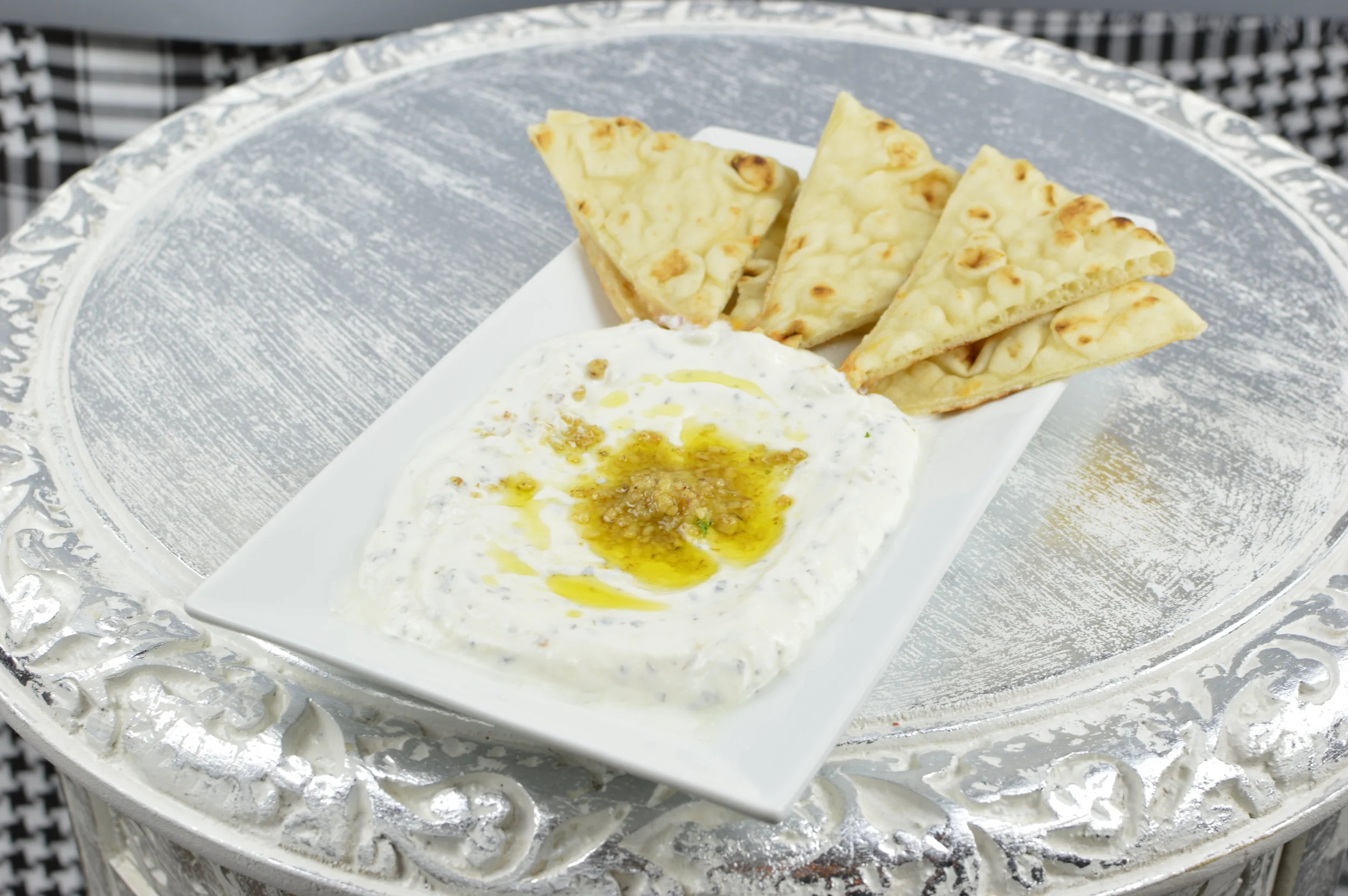 Haydari - Thick and creamy yogurt mixed with walnuts, garlic, mint, and melted butter. $5.95