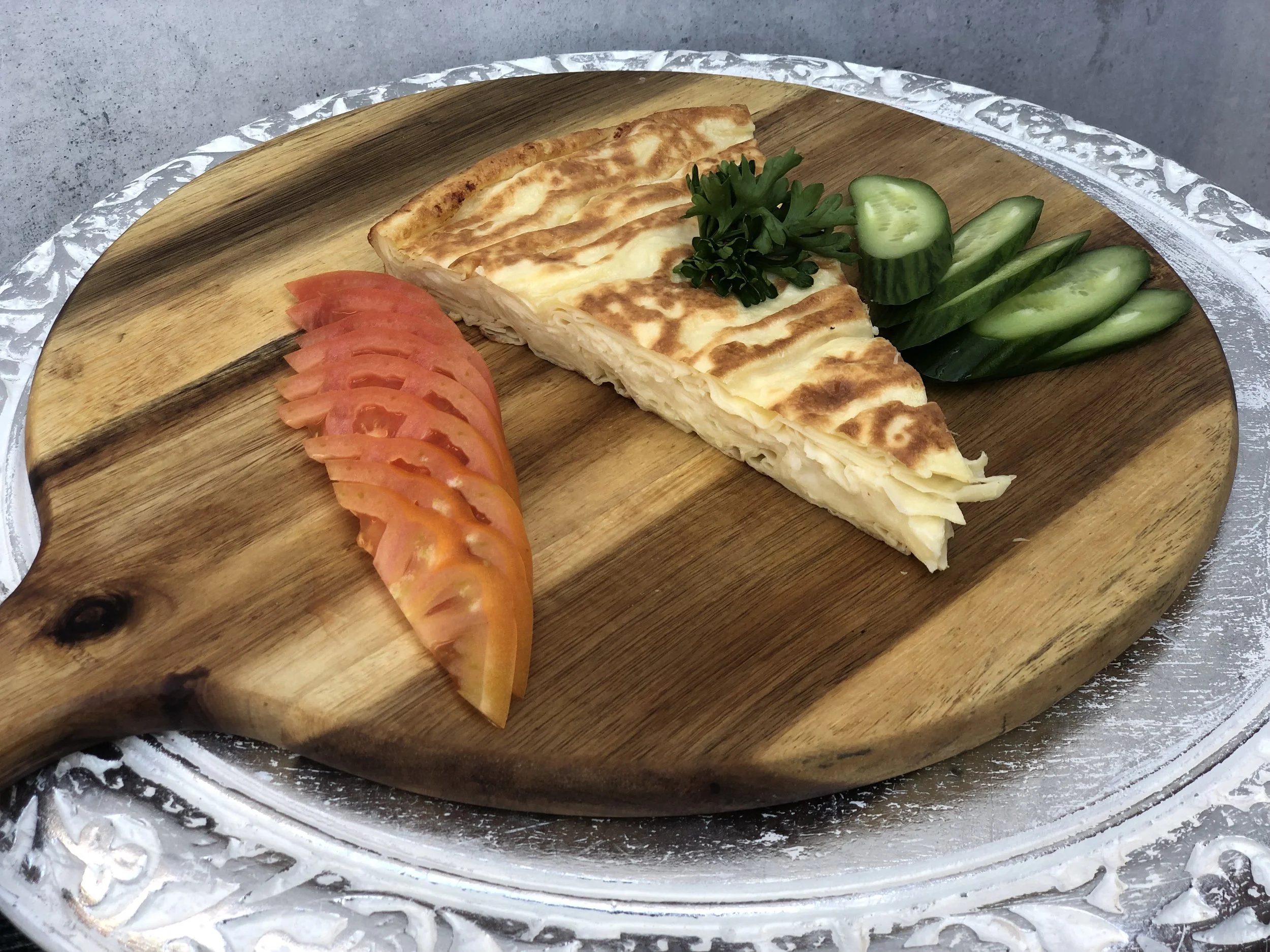 Su Boregi - Thin sheets of hand-rolled dough are boiled before being baked, traditionally layered with a mixture of feta cheese, parsley and ample butter. $7.95