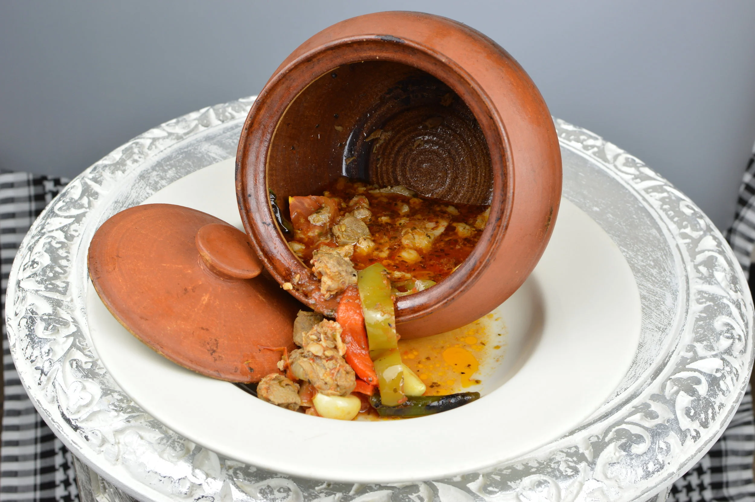 Testi Kebabi (Clay Pot Kabob) - Finely chopped marinated pieces of lamb cooked with special Turkish spices and vegetables in delicious sauce for hours to maximize the taste. Served with rice and salad. $15.95