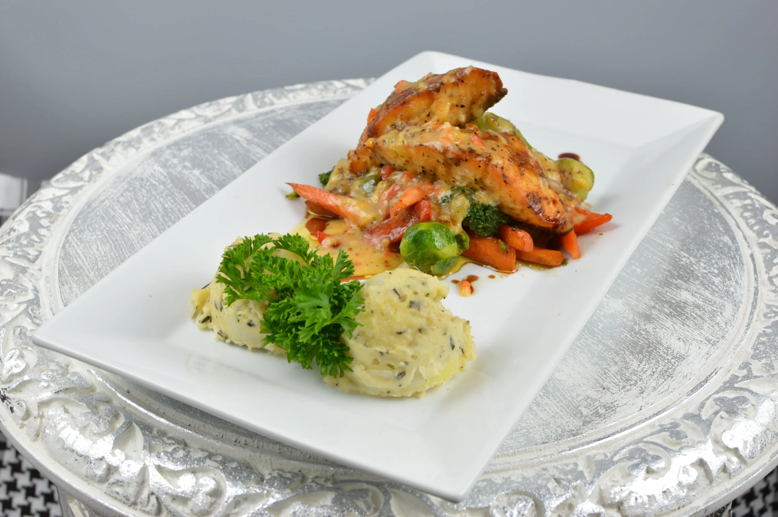 Grilled Salmon - Salmon seasoned with our special Turkish spices and sautéed vegetables. Served with rice. $15.95