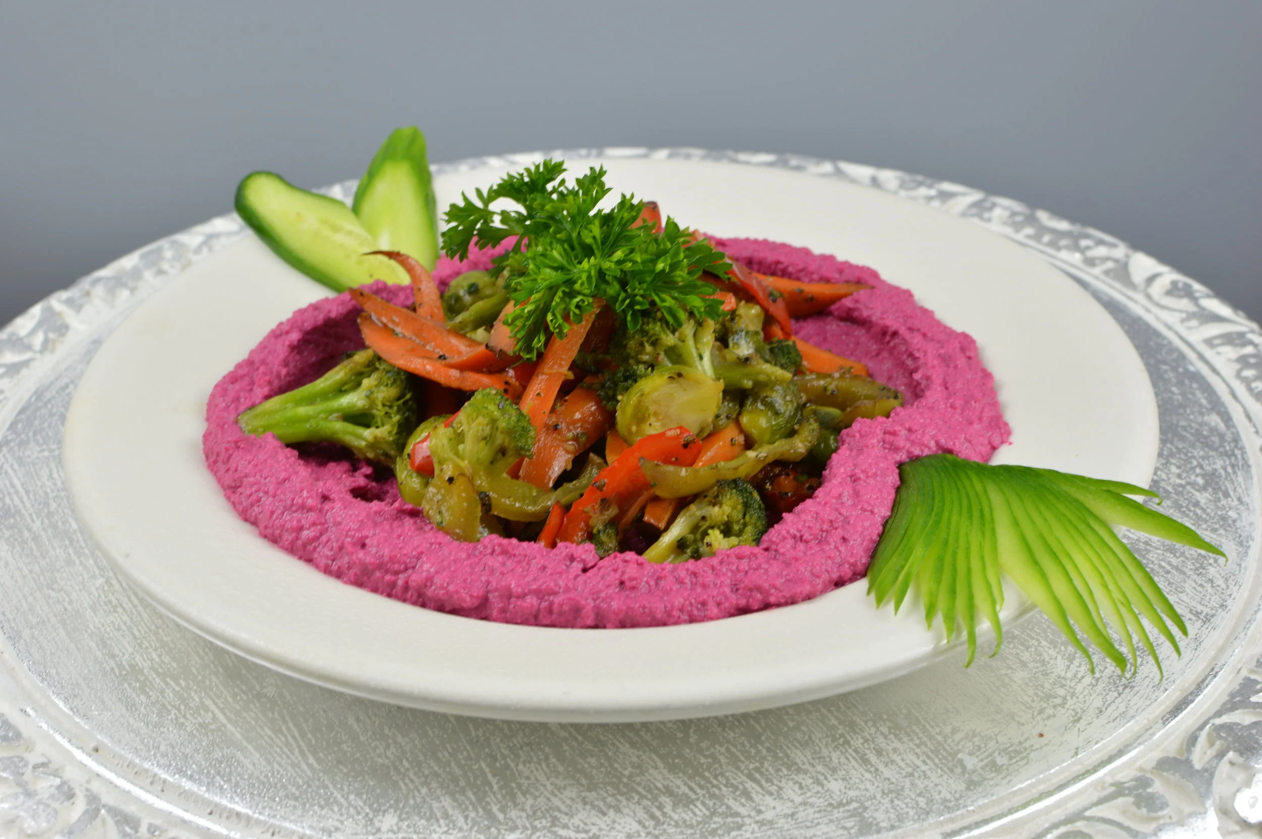 Kurdish Delight - Chickpeas pure mixed with fresh garlic, olive oil, fresh lemon juice, beets and white pepper served with seasonal vegetables and bread. $9.95