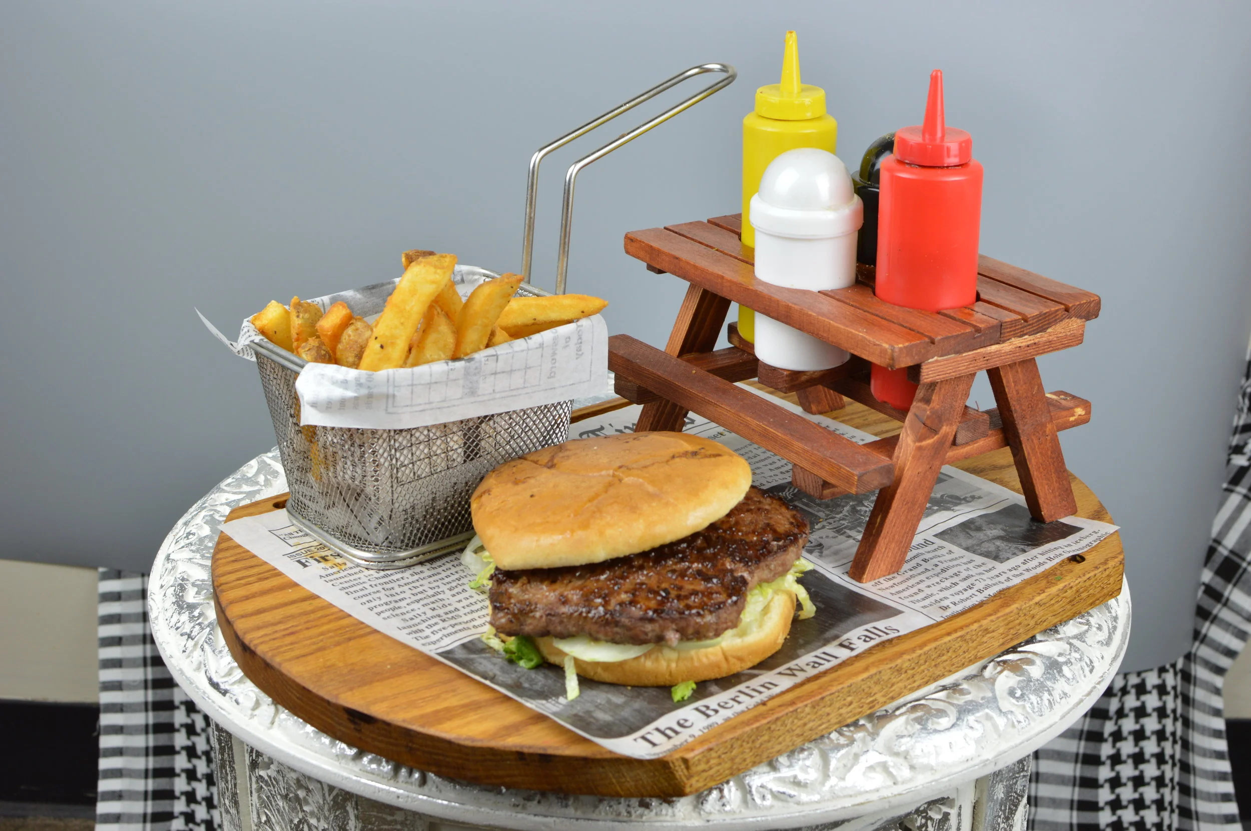 Cheeseburger - 8 oz. of angus beef with fresh lettuce, tomatoes, onions, mayonnaise, cheese (American or Swiss) served with French fries and drink. $11.95