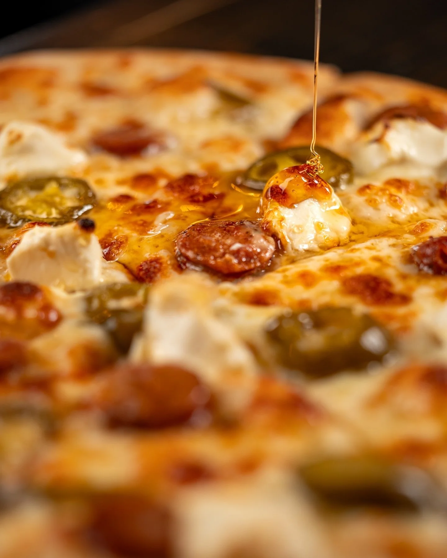 Cream cheese does belong on pizza. The &ldquo;Honey I Shrunk The Pigs&rdquo; has become a customer favorite, and for good reason! 🍯🐷

Honey I Shrunk The Pigs Pizza:
Smoked andouille sausage, cream cheese, orange blossom honey, and candied jalape&nt