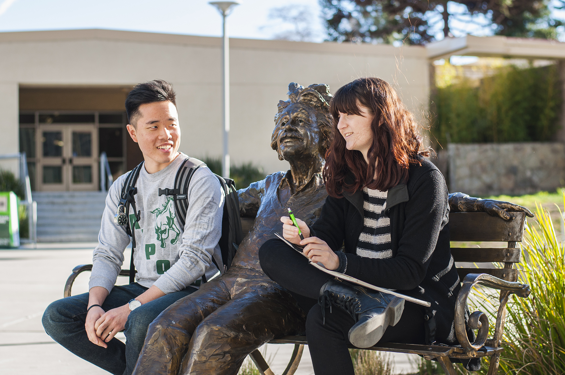 Students on a bench in campus