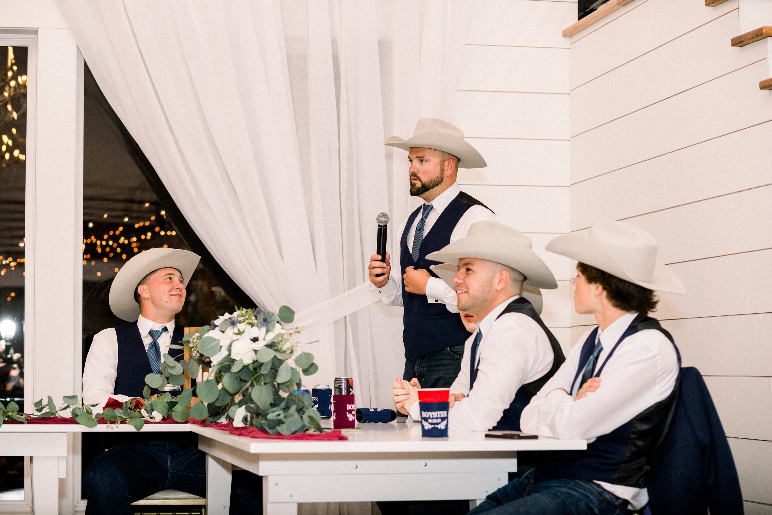 Emerson Fields Wedding Kelsi Kliethermes Photography groomsmen toast reception cowboy hat speech.jpg