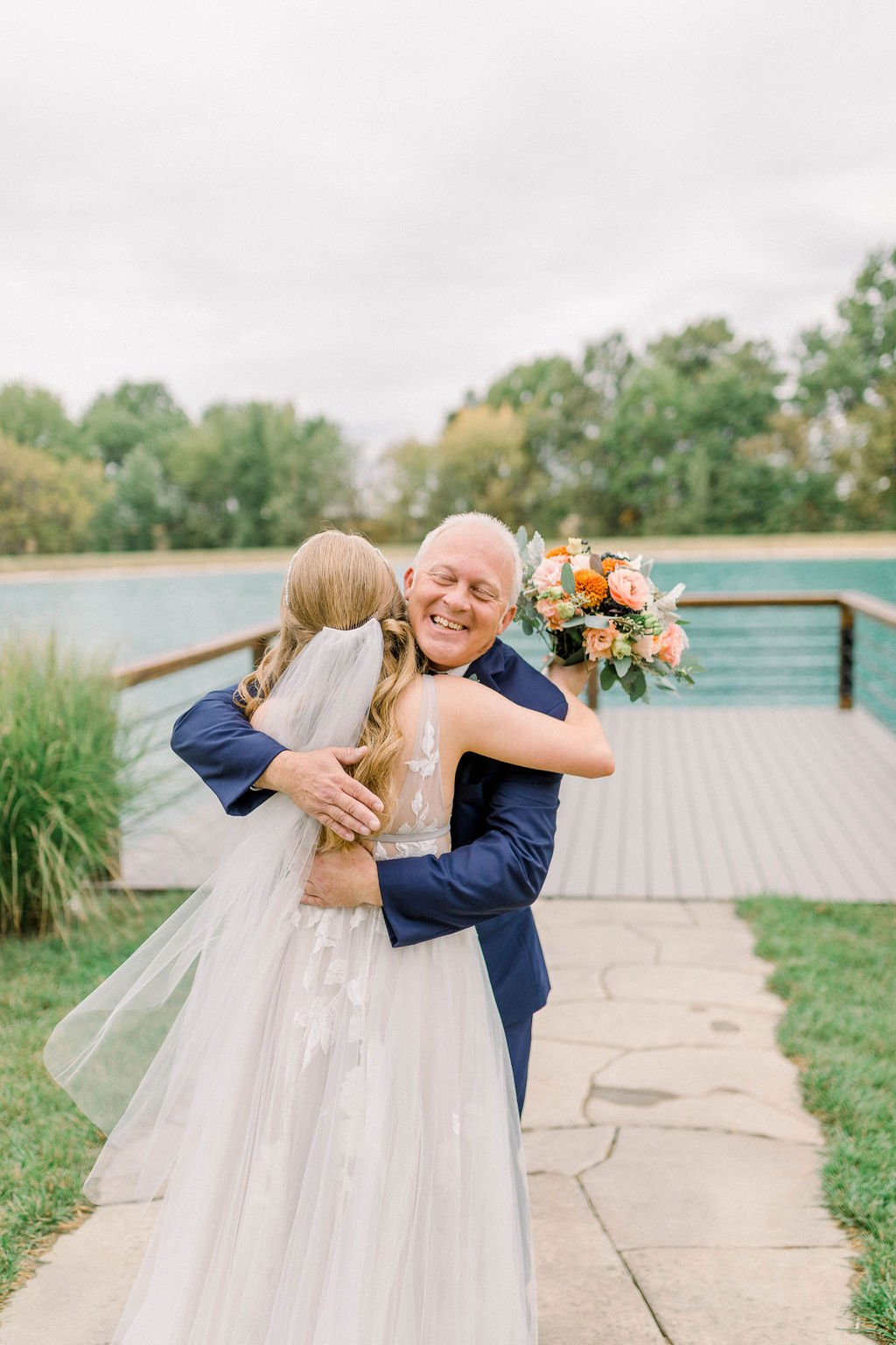 father daughter first look fall wedding lakeside countryside wedding venue emerson fields (4).jpg