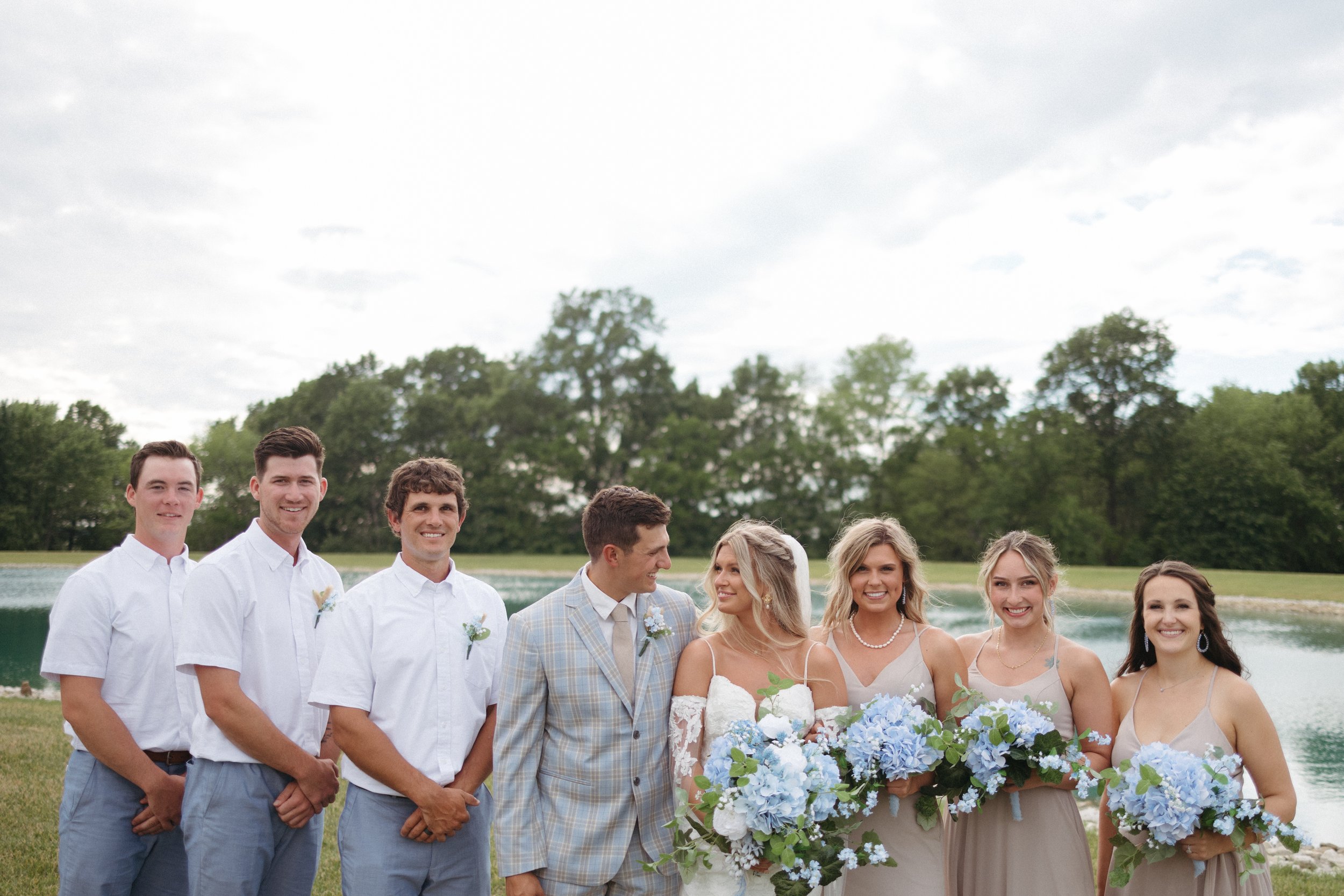 wedding party outdoor summer portraits fairytale powder blue bridesmaids neutrals emerson fields venue missouri (6).jpg