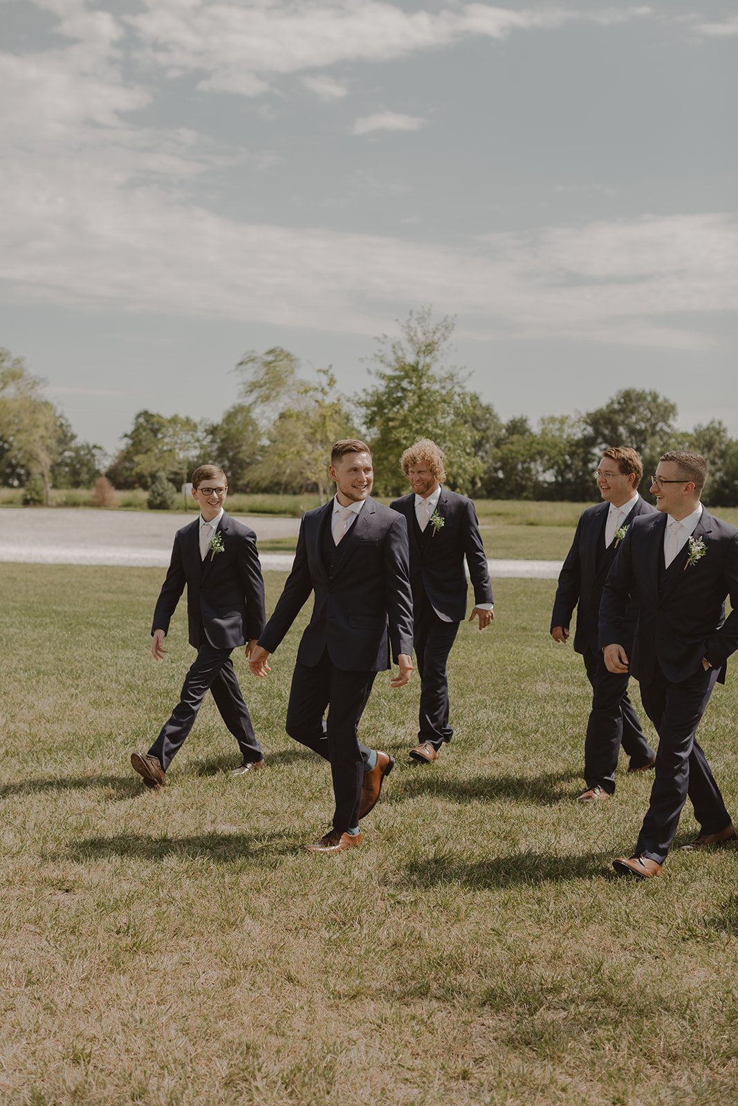 groomsmen suits relaxed candid wedding photo.jpg