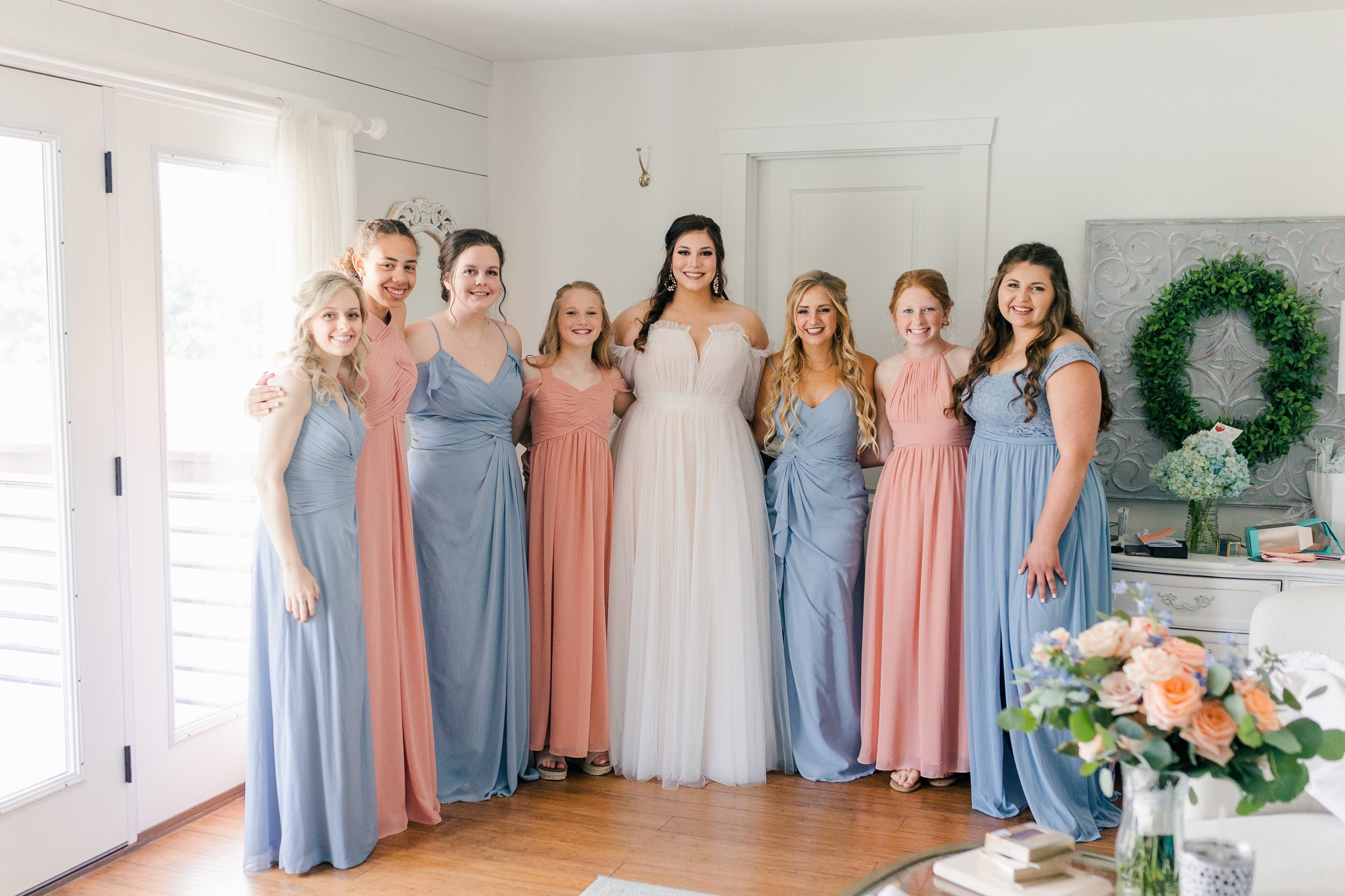 bride bridesmaid peach blue dresses for spring wedding.jpg