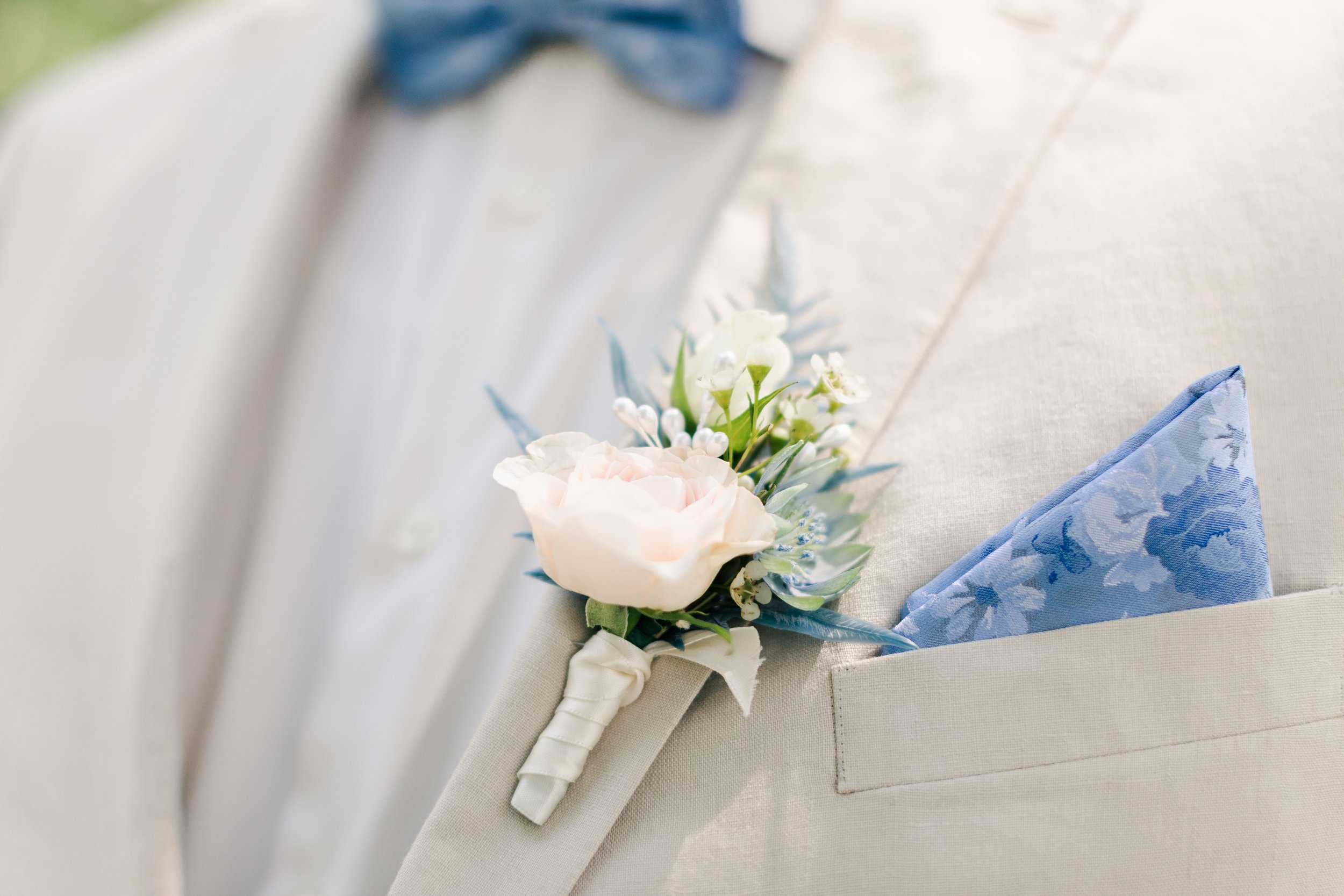 mens summer suit wedding flowers label pocket.jpg