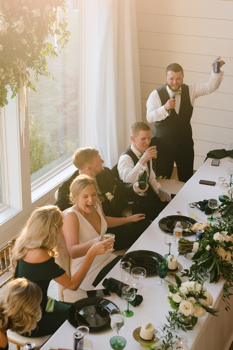 wedding+toasts+head+table+emerson+fields+reception+(1).jpeg