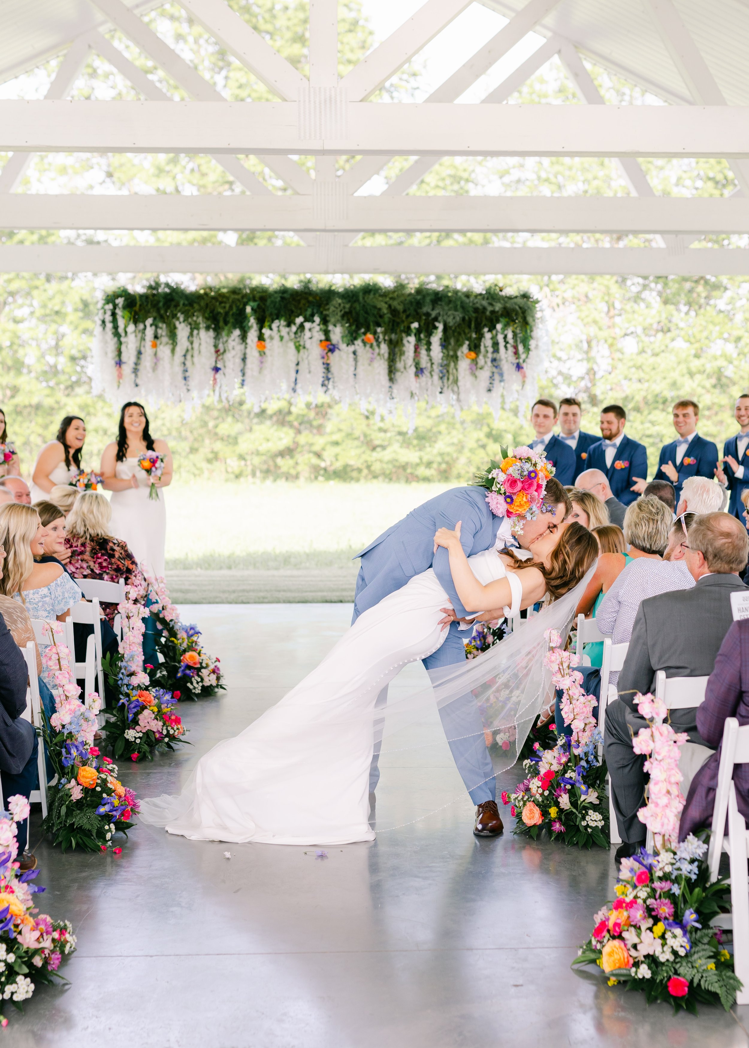 Outdoor-Spring-Wedding-Kissing-the-Bride-at-Missouri-Destination-Wedding-Venue.jpg