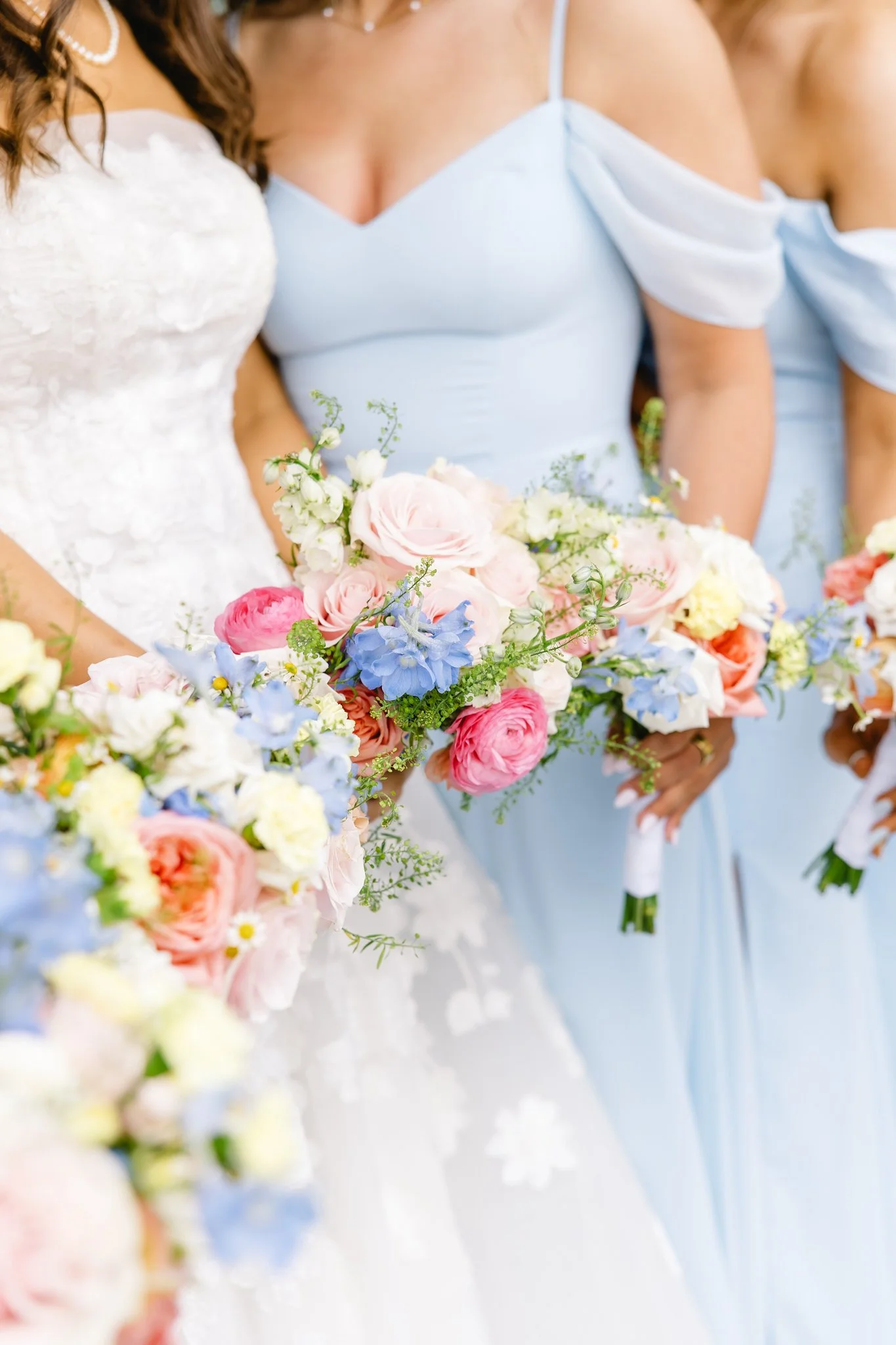 bridesmaids-in-blue-group-photo-at-Emerson-Fields-wedding-venue-with-DIY-floral-bouquets-from-Flower-Moxie-6.jpg