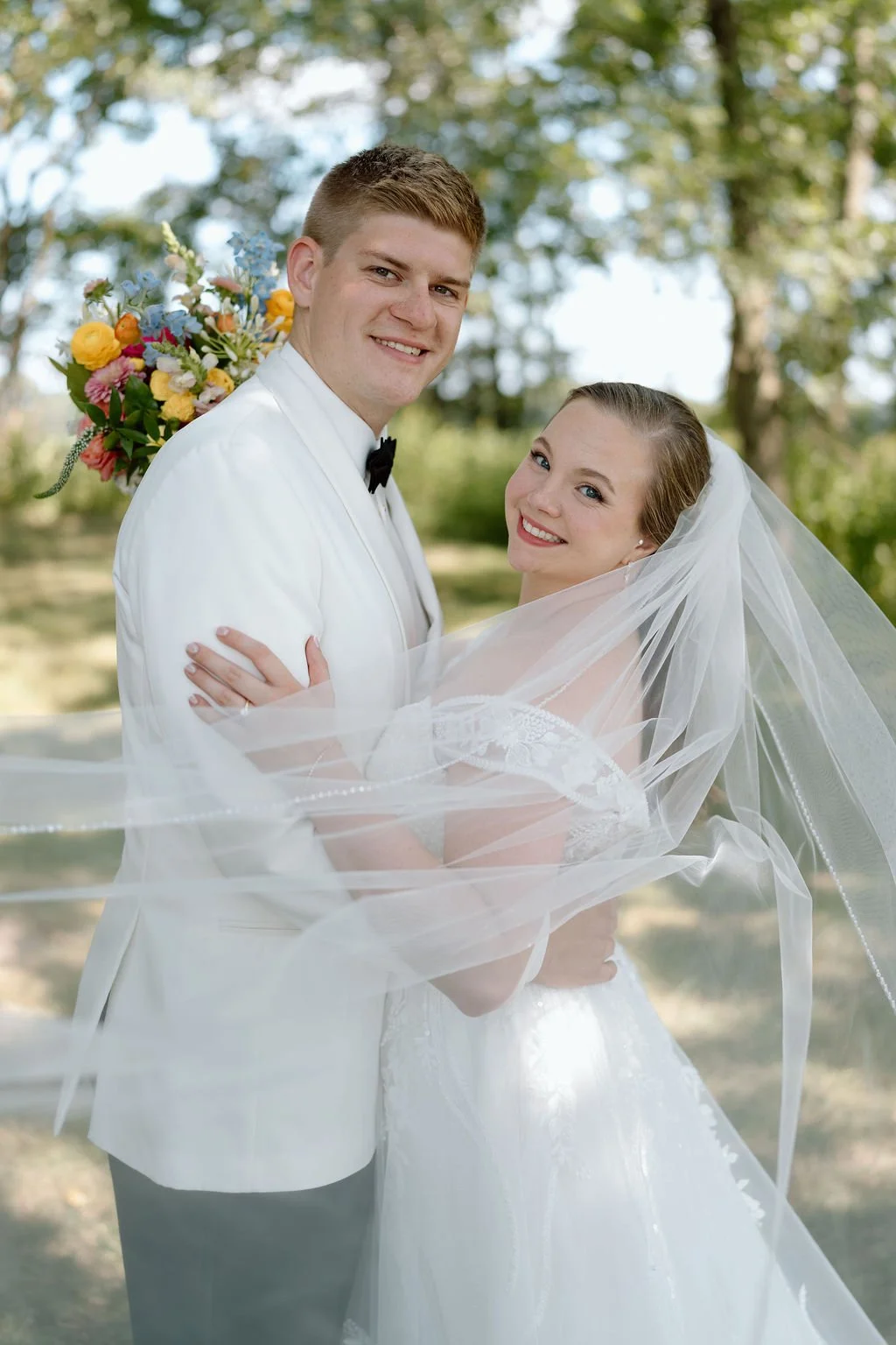 Bride and groom from Illinois on their wedding day at Emerson Fields in Missouri