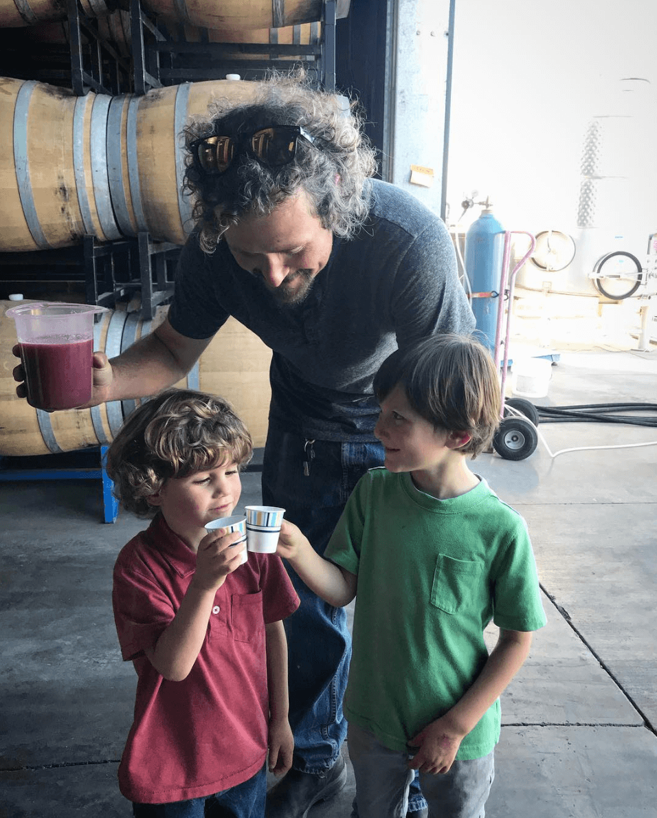 Winemaker Denis Hoey with his sons at winery