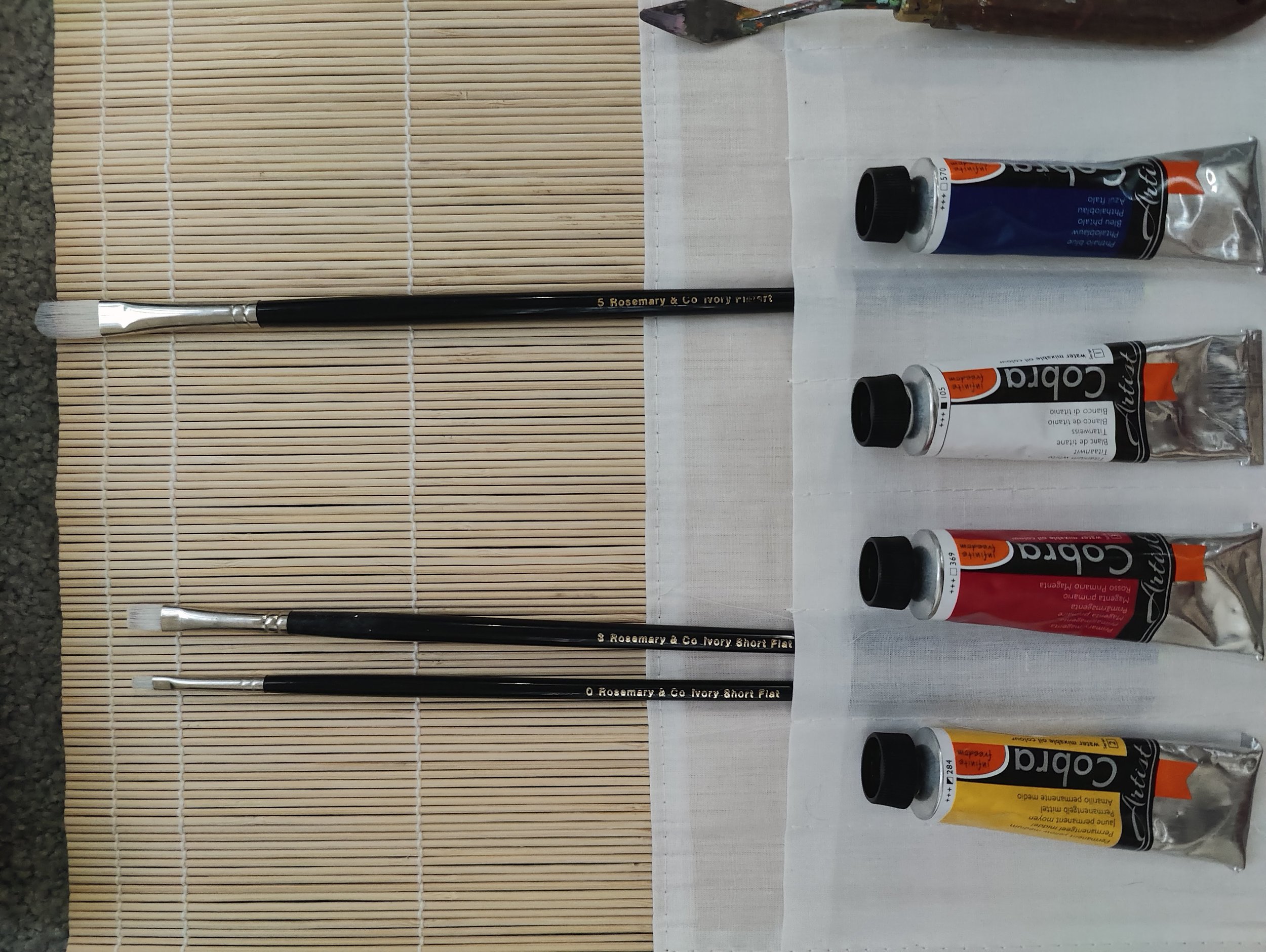 Close-up of paints and brushes