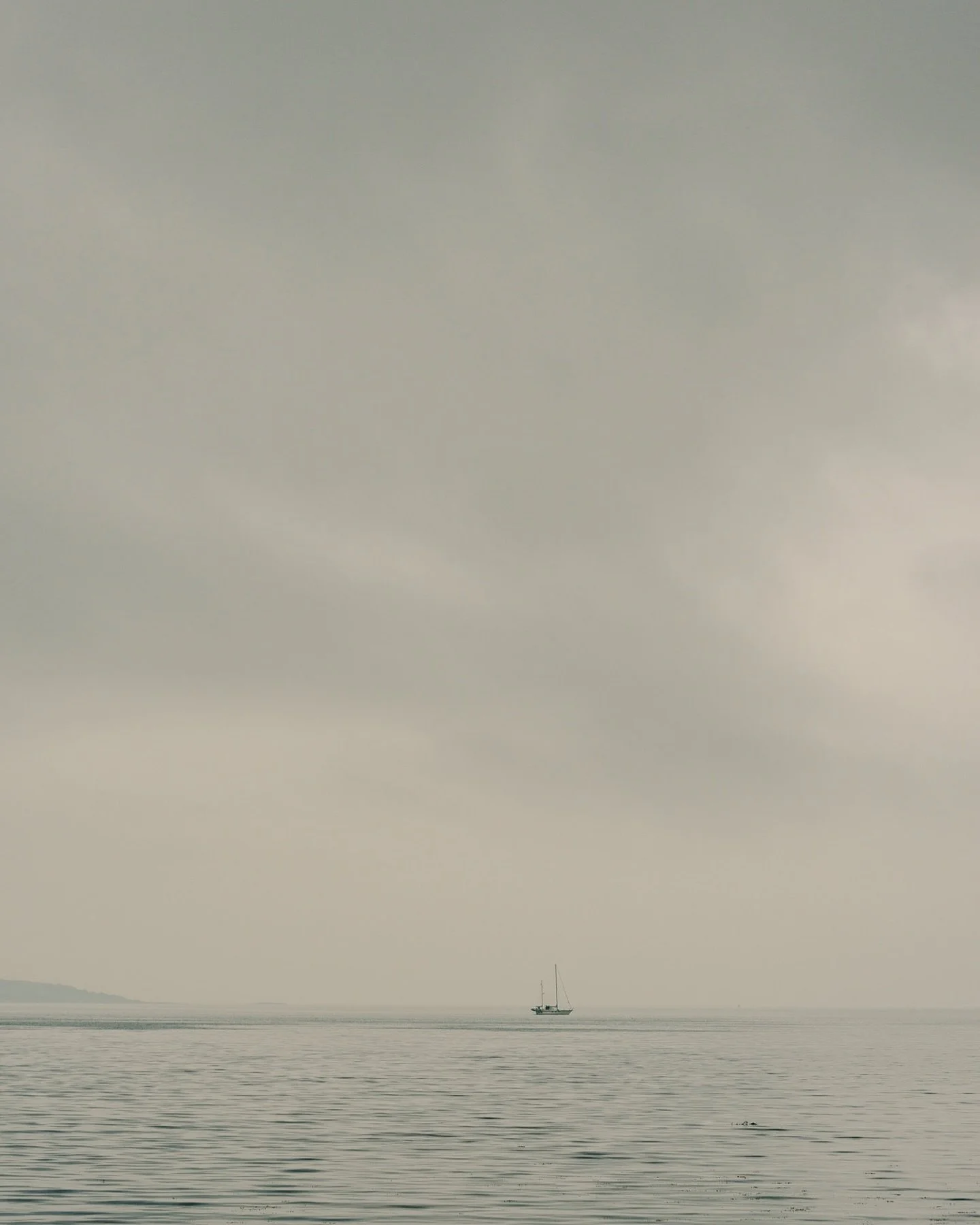 Drifting in the quiet. A foggy Arran morning. #Scotland #Arran #IsleOfArran #Seascape #Minimalism #MoodyGrams #FoggyMorning #Stillness #OceanSoul #BoatLife #Solitude #Wanderlust #CoastalVibes #NatureLover #SoftTones #SereneScapes #SeaMist #QuietMomen
