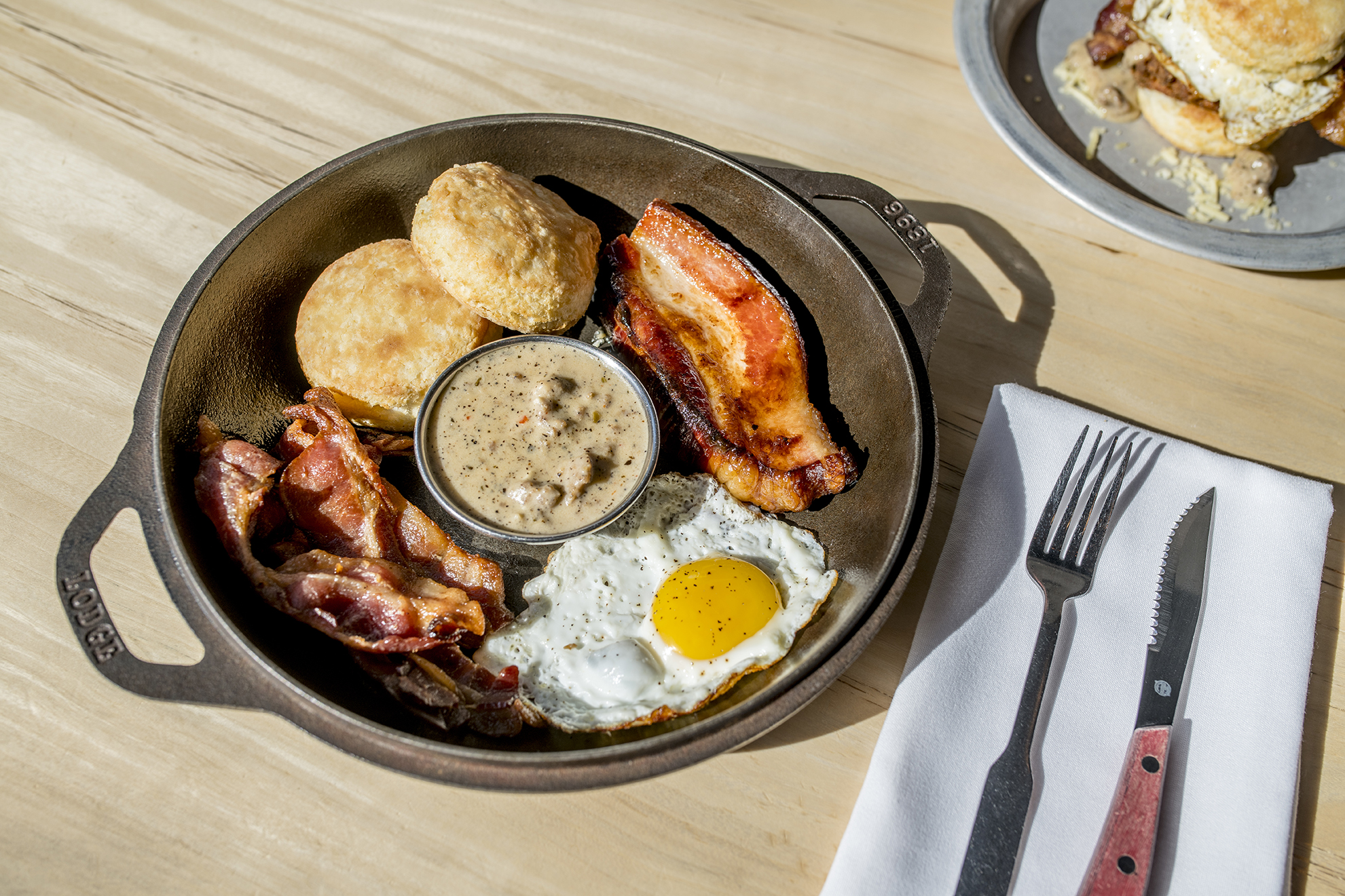  Fool’s Gold -  2 Biscuits, Local Ham, Bacon, Sawmill Gravy with Egg add-on . || Image:  Twin Spire Photography  - Published: 10.9.2019 