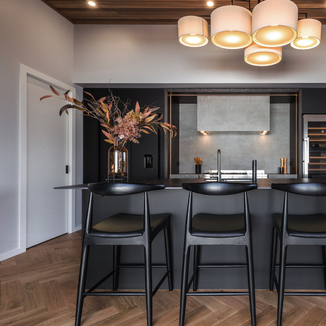 Embracing the perfect blend of modern elegance and natural warmth in one of our latest projects, a new matte black kitchen with timber accents and porcelain benchtops. 

Check out our website for more photos of this amazing project, www.graftjoinery.