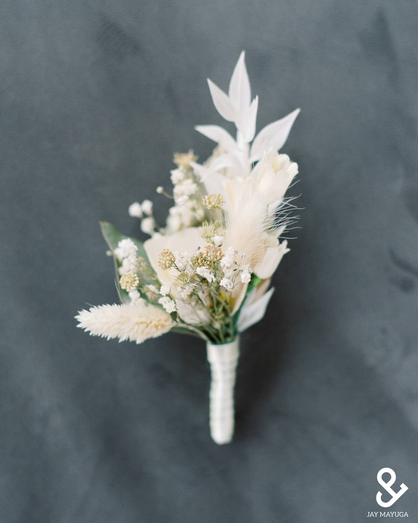 All white boutonniere! Lovely!