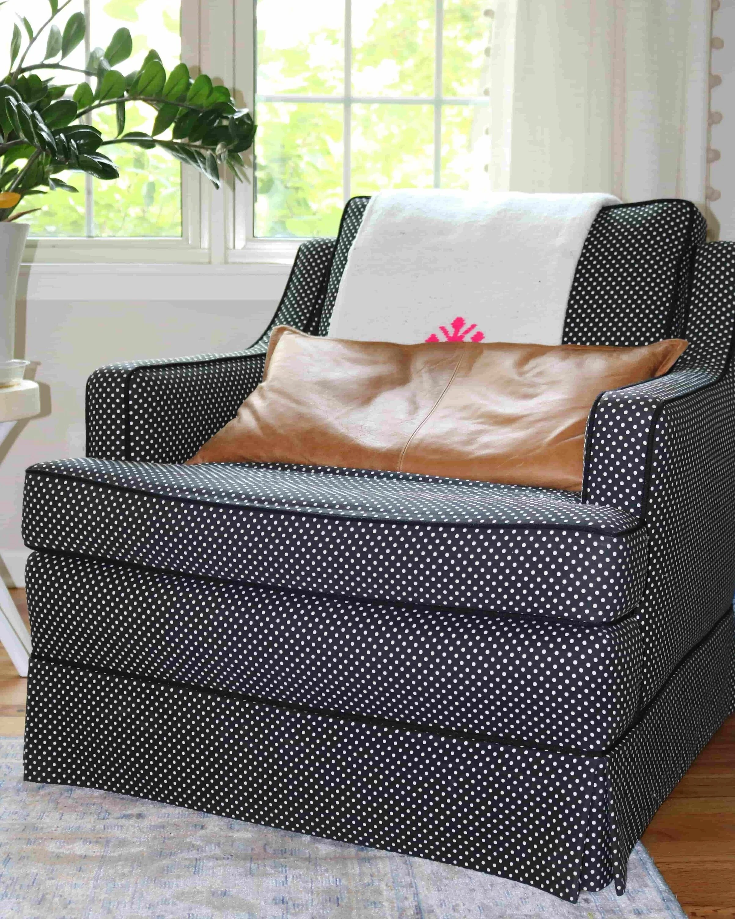 CHEYENNE LEATHER PILLOW: HOUZZ; WHITE MOROCCAN THROW: ETSY