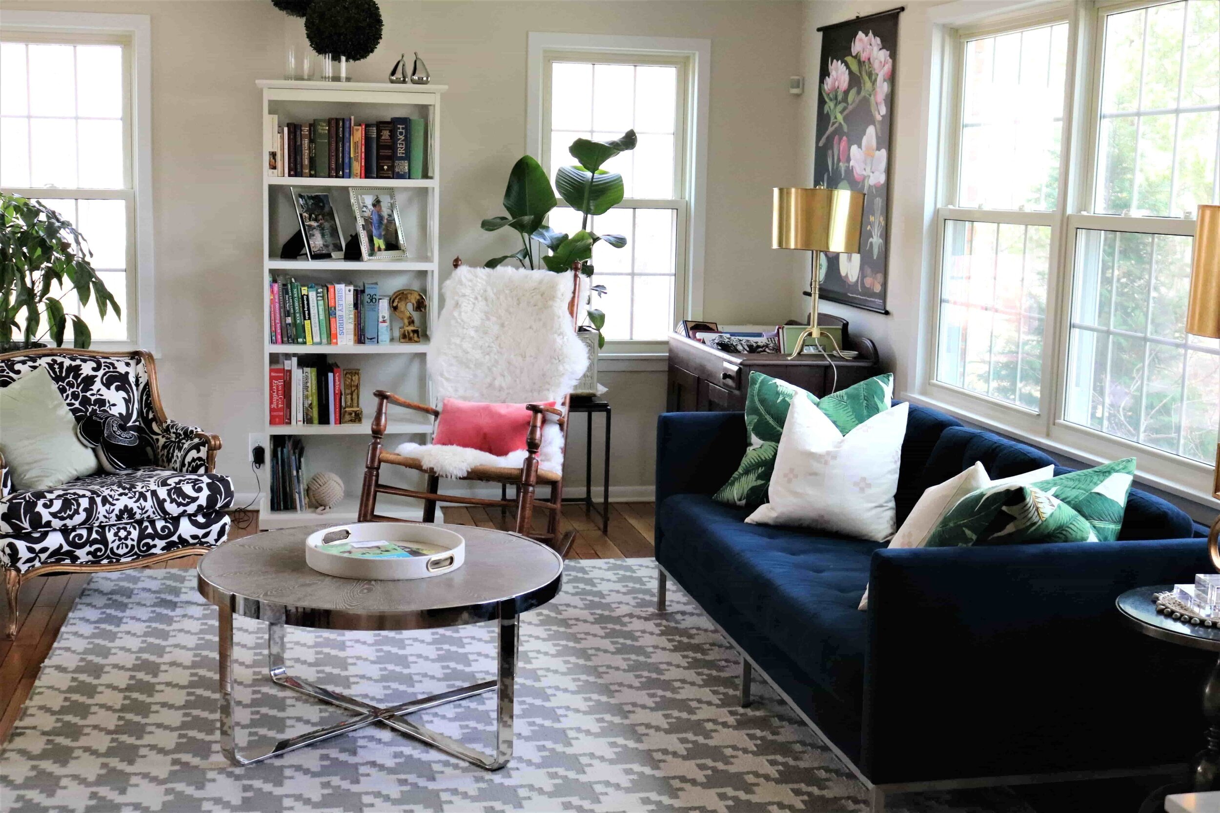 COUCH: ROOM &amp; BOARD; KENTE CLOTH PILLOWS: HEDDLE AND LAMM ON ETSY; BANANA LEAR PRINT PILLOWS: AT HOME AND CO.; BOTANICAL PRINT POSTER: STYLEDEVIESTORE ON ETSY